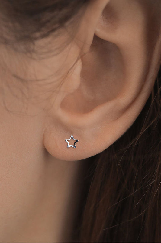 sterling-silver-star-outline-studs-closeup
