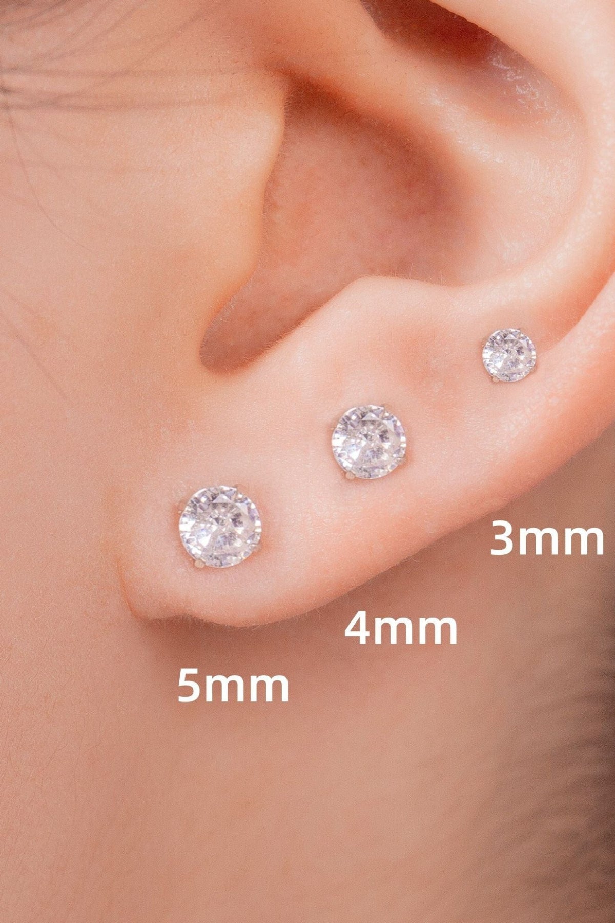 sterling-silver-cz-sparkly-studs-various-sizes-model
