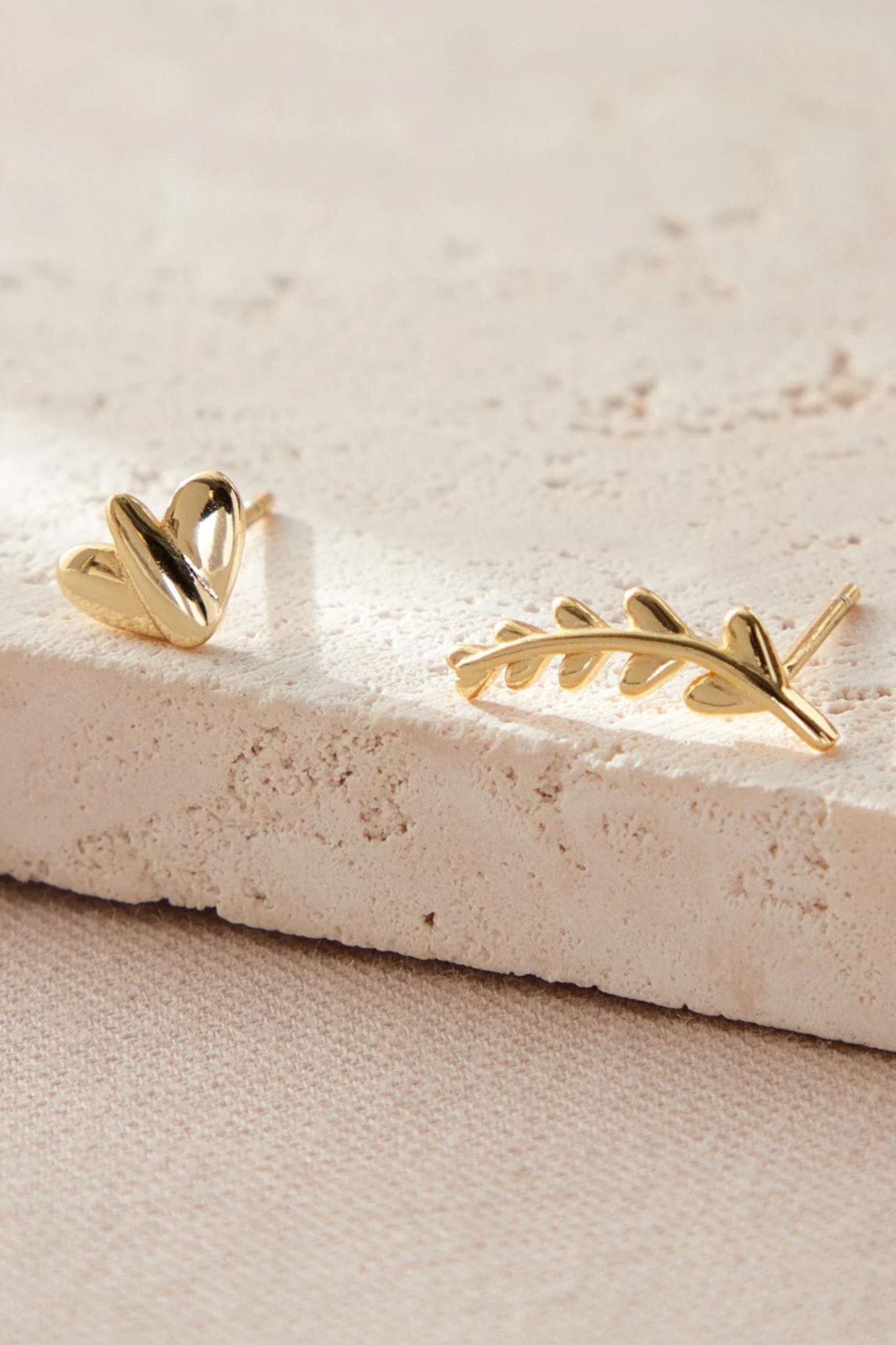 sterling-silver-mismatched-leaf-studs-in-gold