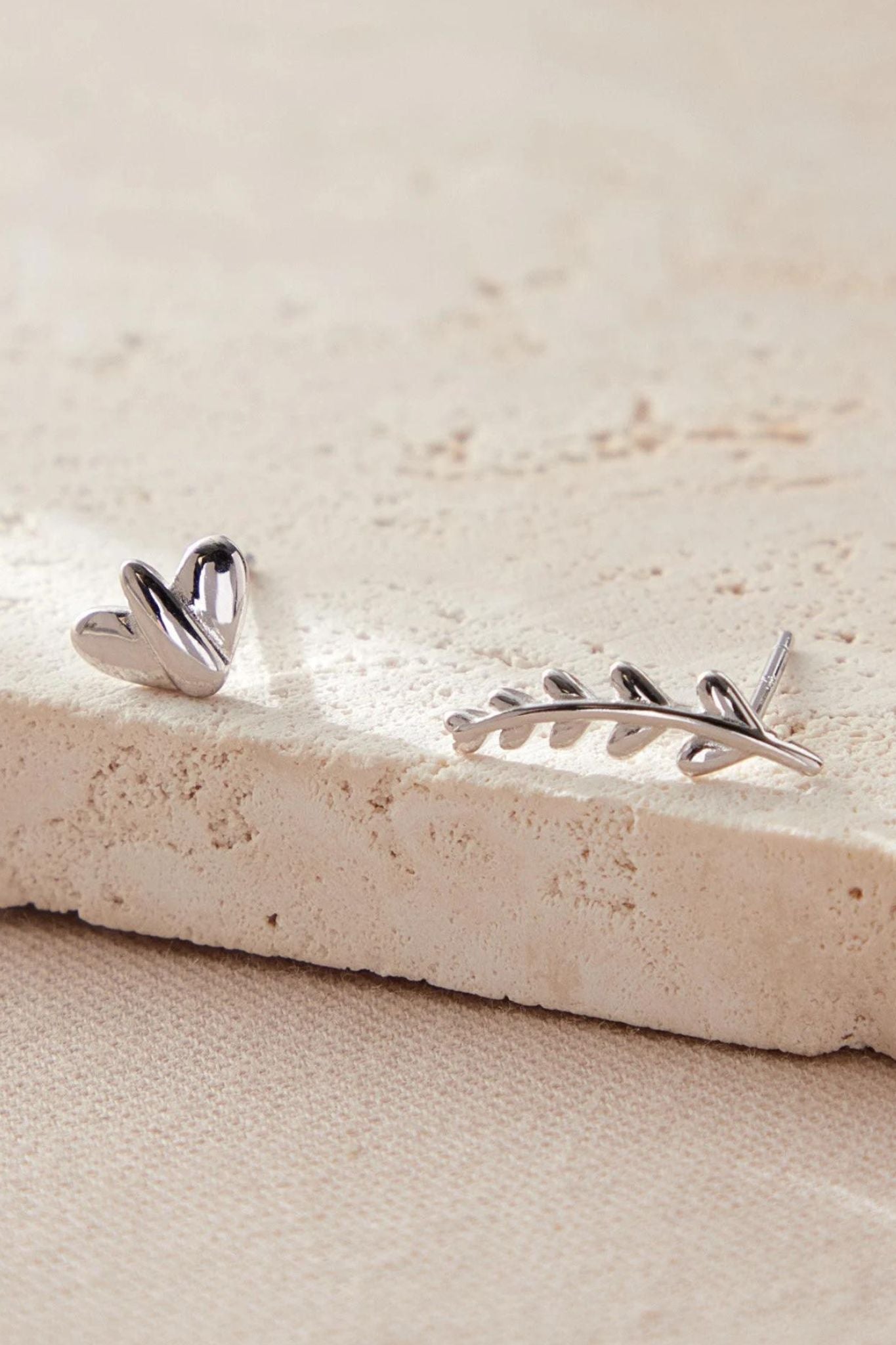 sterling-silver-mismatched-leaf-studs-in-silver