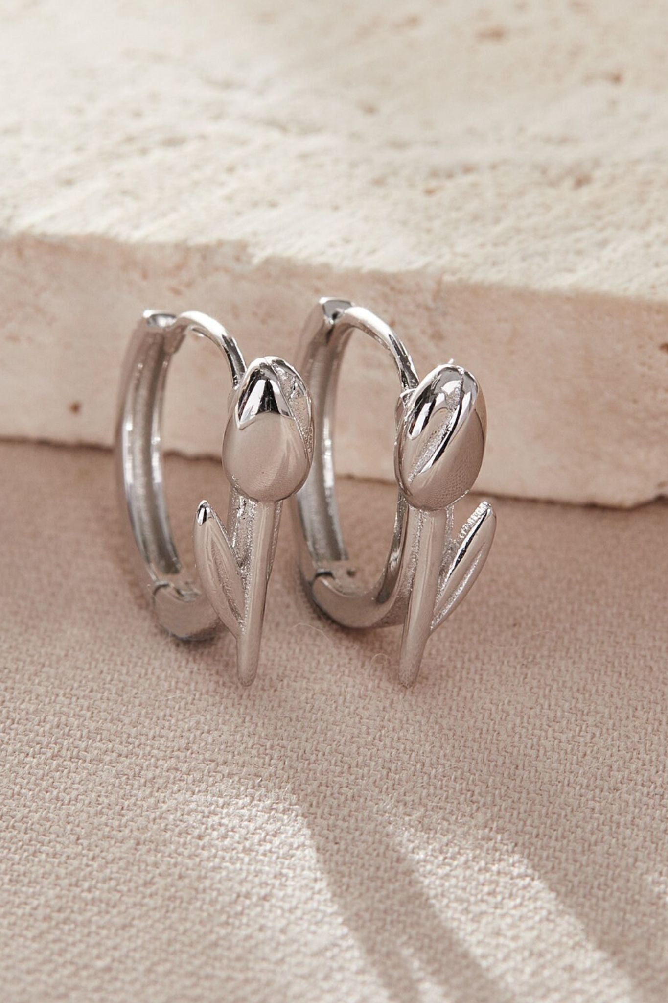 sterling-silver-tulip-hoops-in-silver-closeup