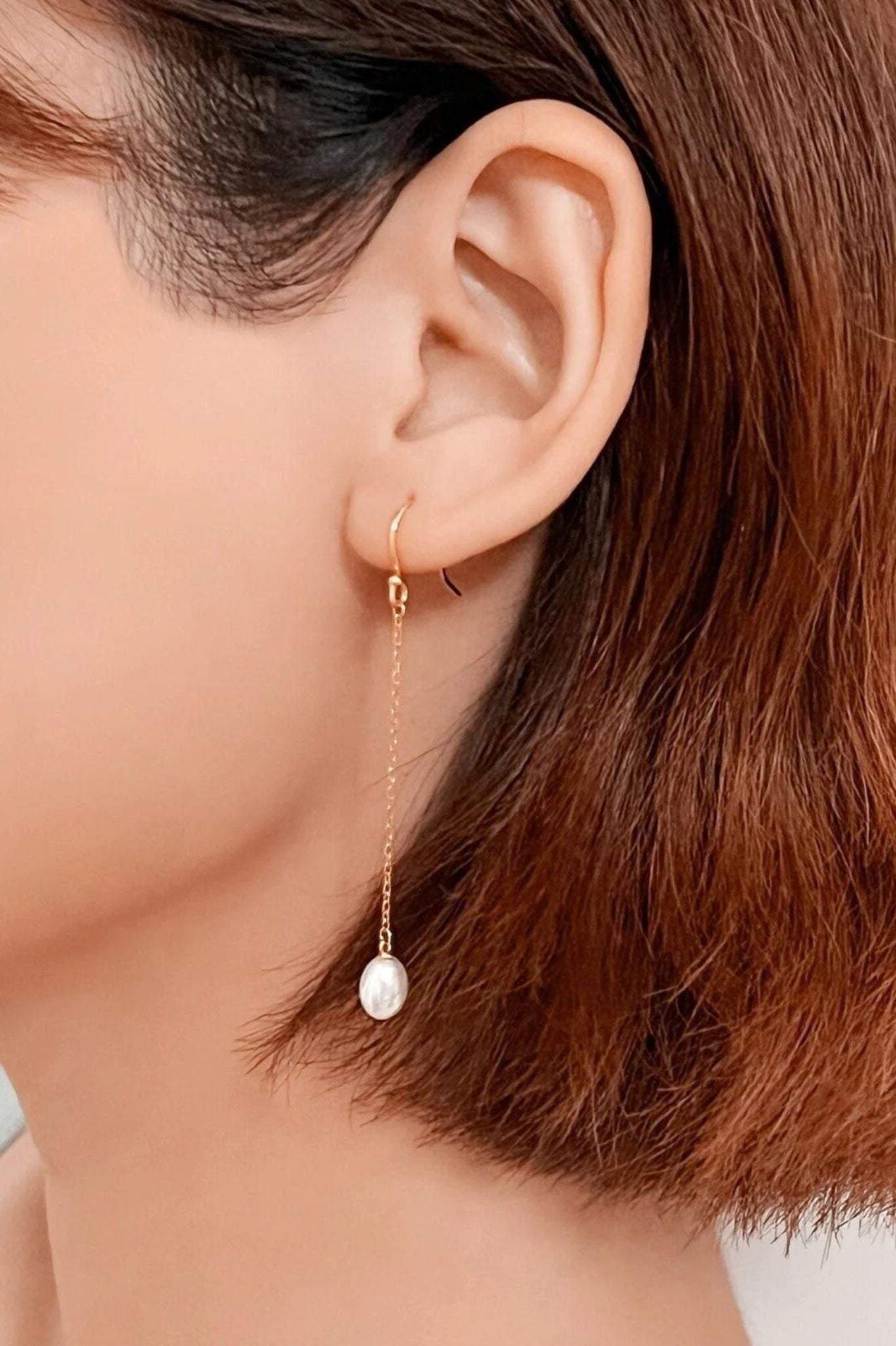 sterling-silver-pearl-drop-earrings-in-gold-model