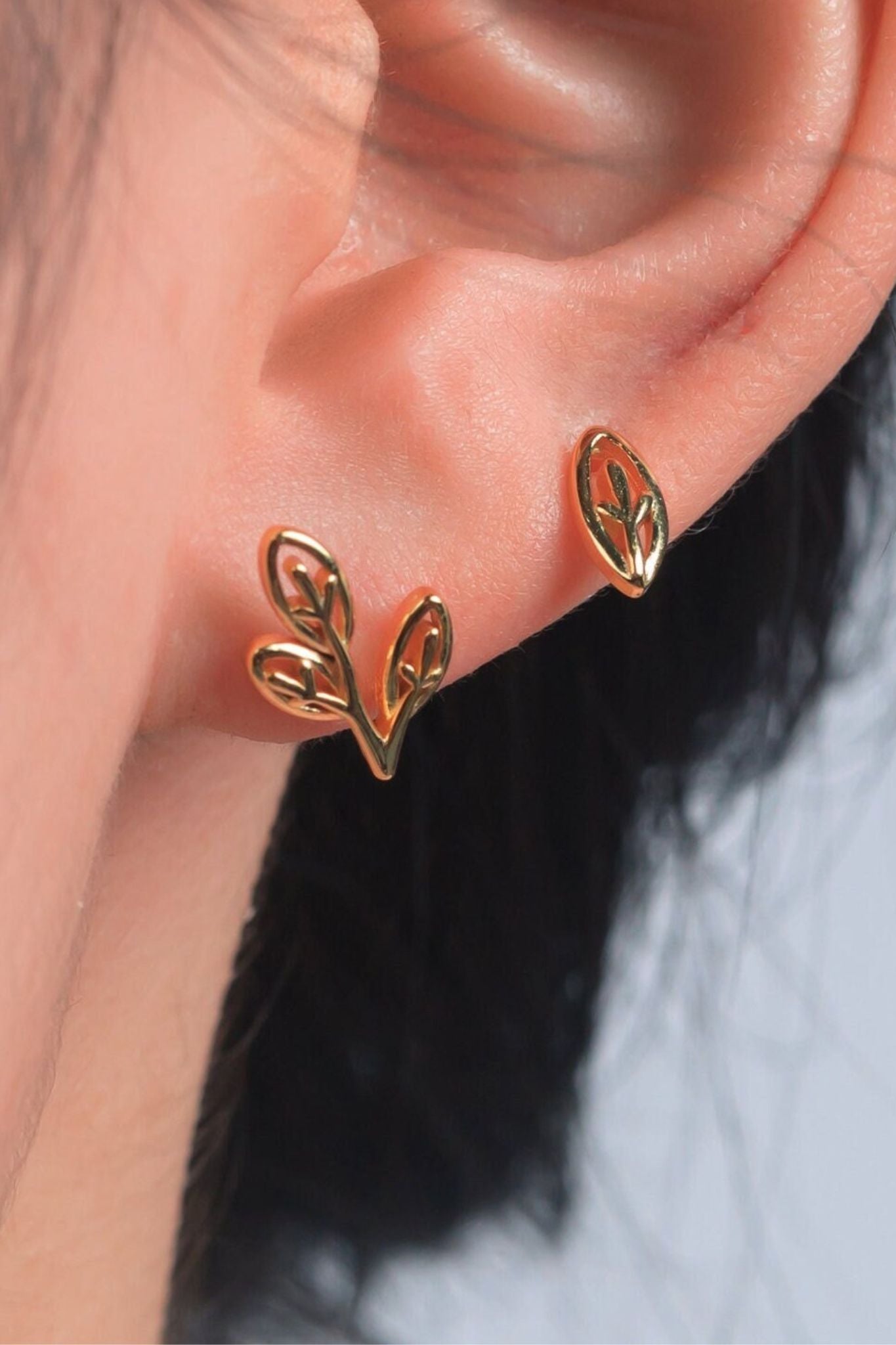 sterling-silver-mismatched-olive-leaf-studs-in-gold-model