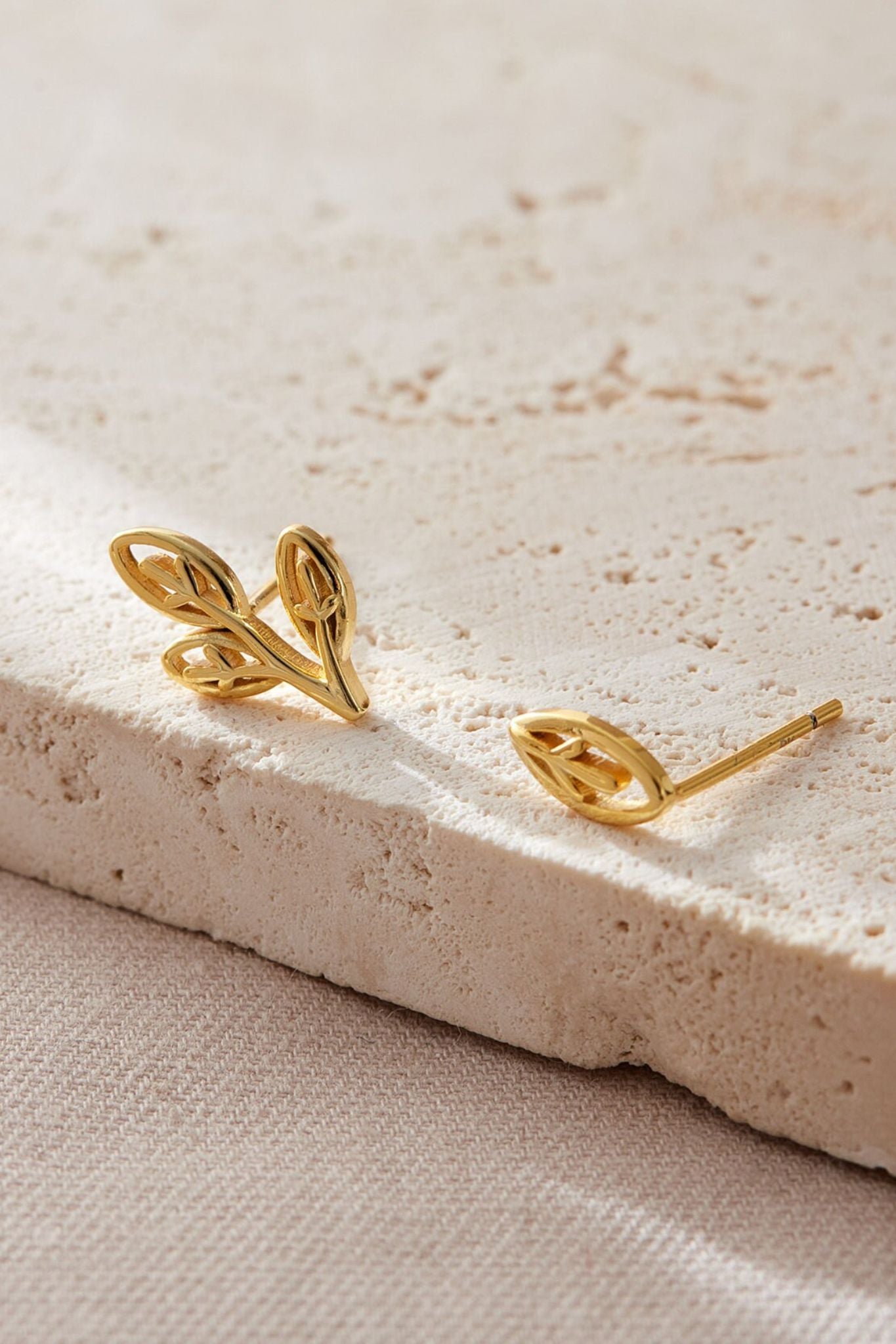 sterling-silver-mismatched-olive-leaf-studs-in-gold