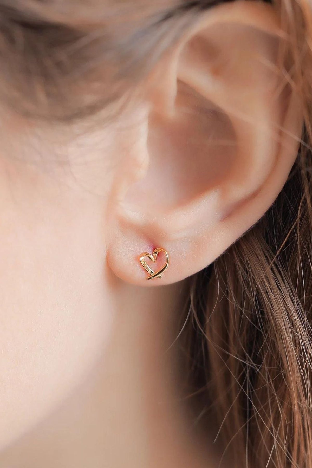 sterling-silver-abstract-heart-studs-in-gold-model