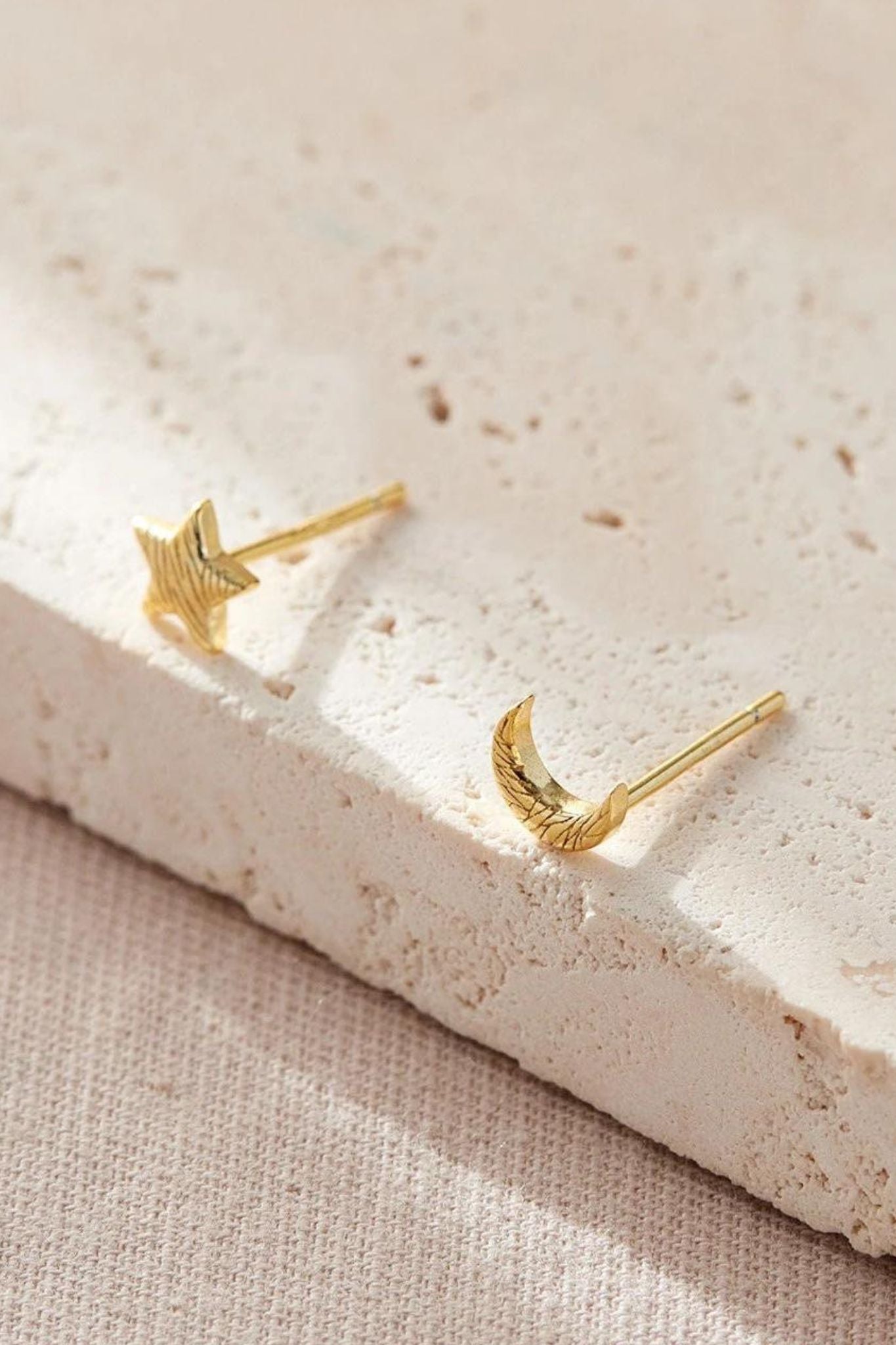 sterling-silver-mismatched-star-moon-studs-in-gold