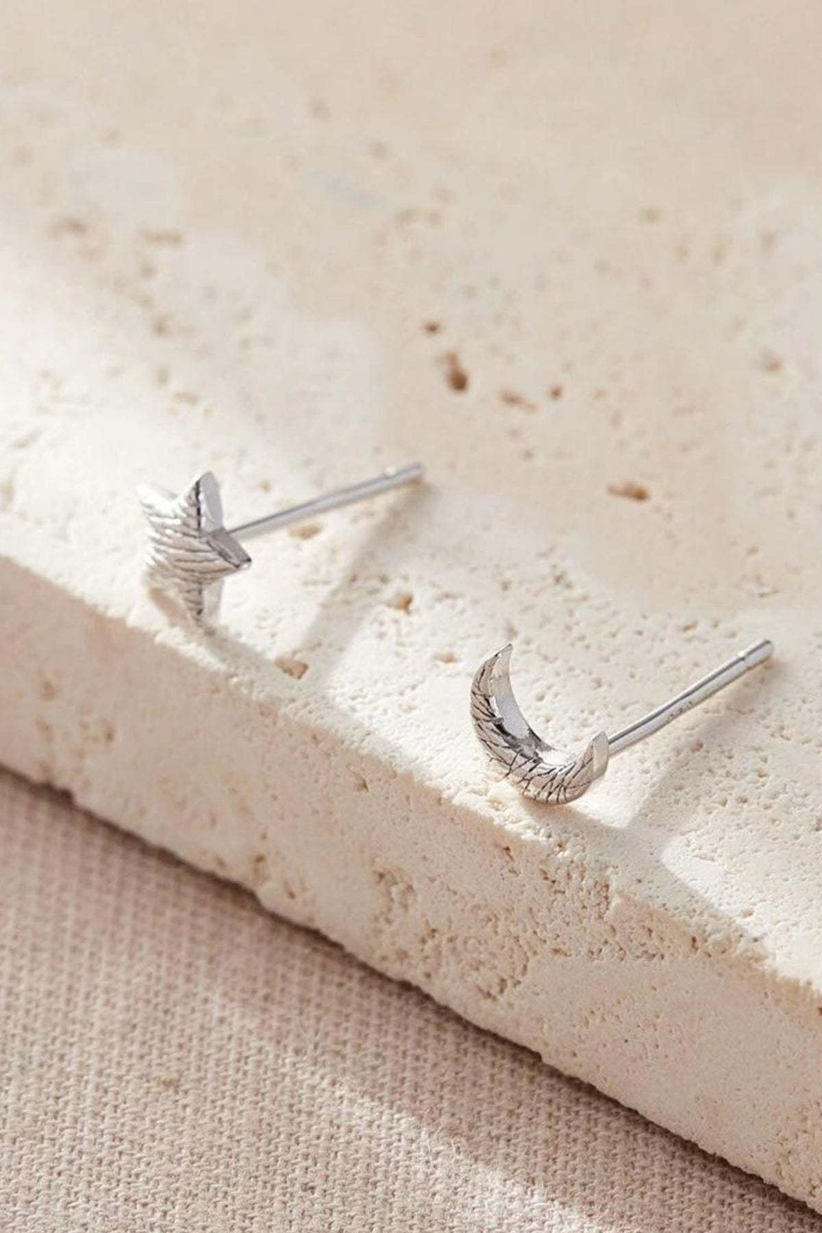 sterling-silver-mismatched-star-moon-studs-in-silver