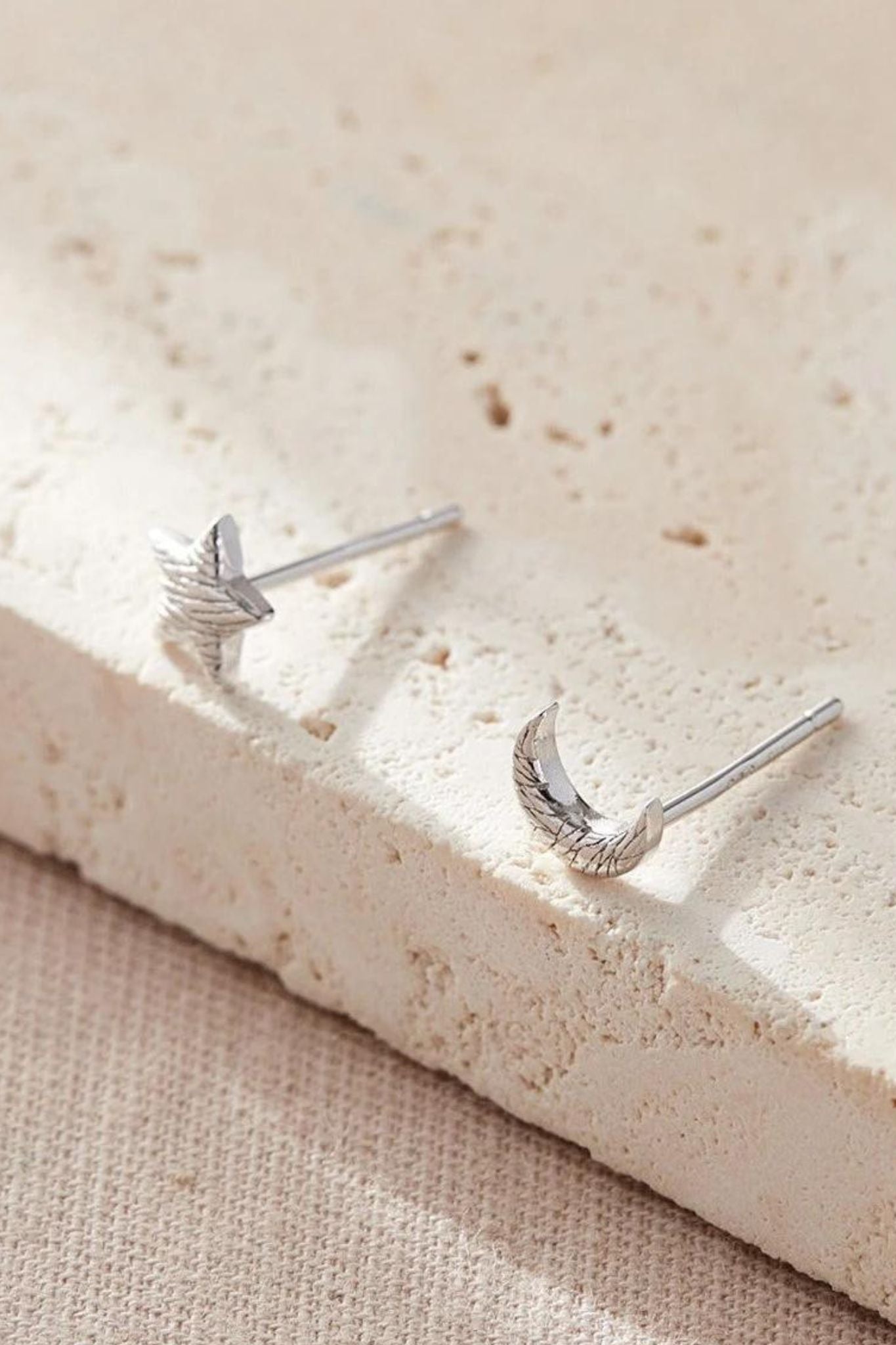 sterling-silver-mismatched-star-moon-studs-in-silver