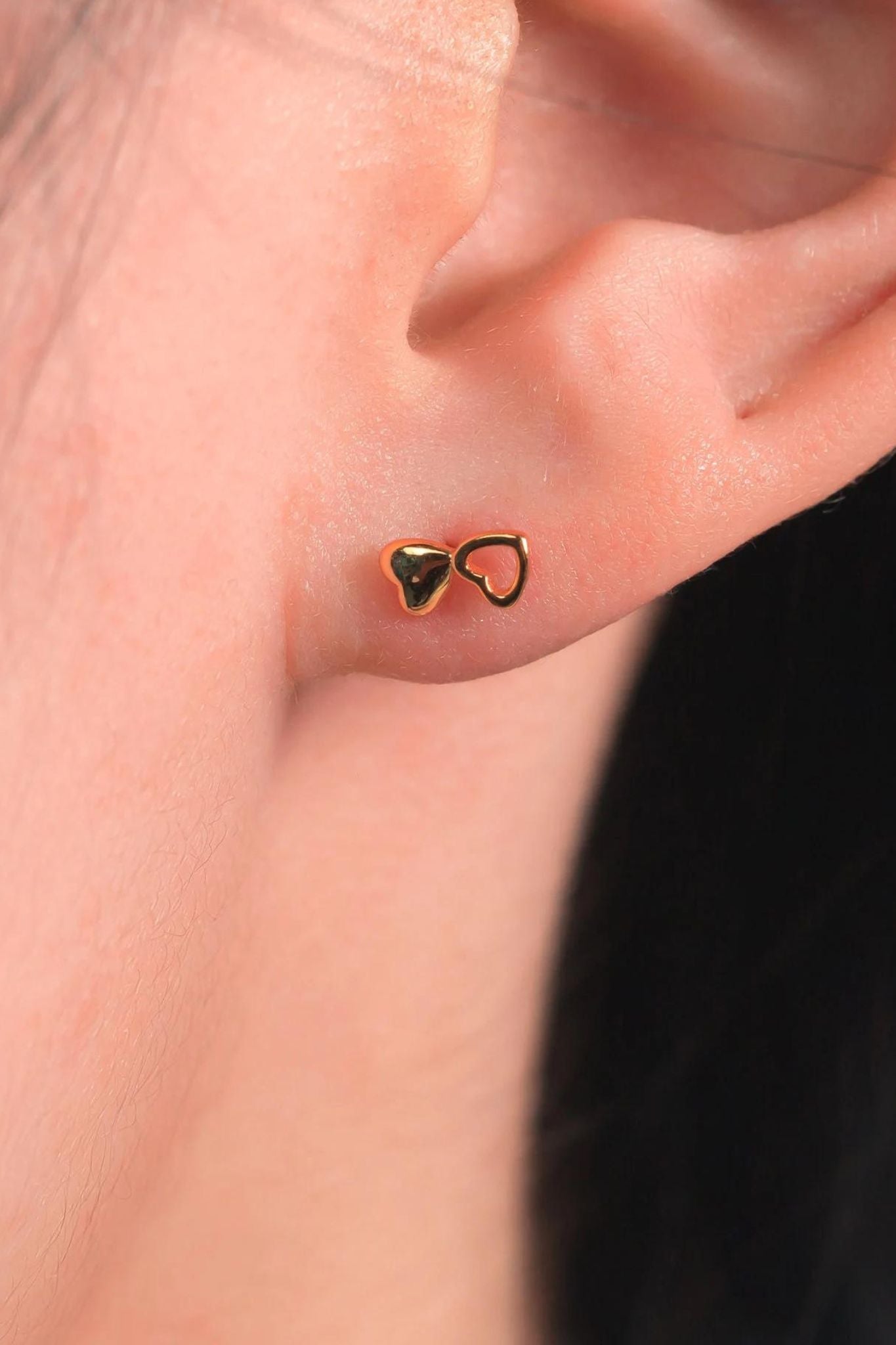 sterling-silver-double-heart-studs-in-gold-model