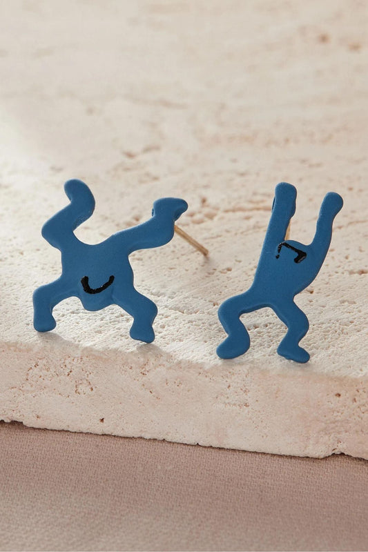 close up of the blue leaping frog earrings