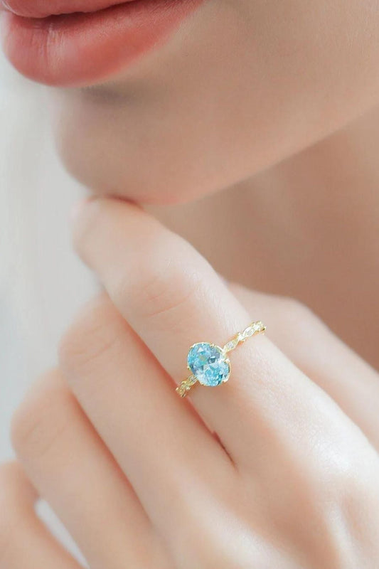 sterling-silver-aquamarine-cz-ring-model-finger