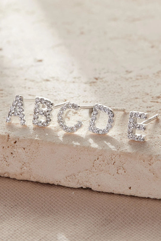 sterling-silver-cz-alphabet-studs-in-silver-single-earrings-closeup
