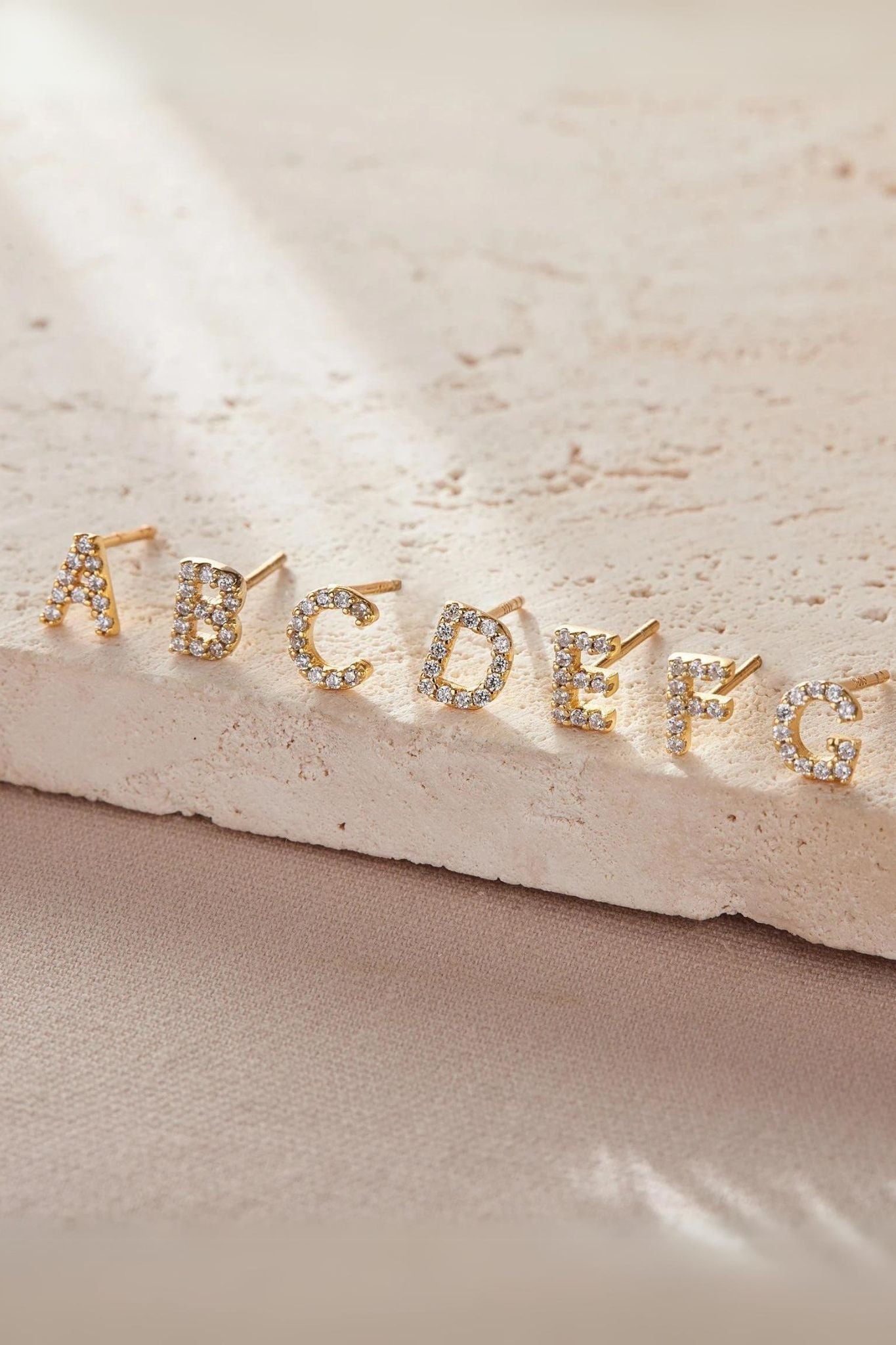 sterling-silver-cz-alphabet-studs-in-gold-single-earrings