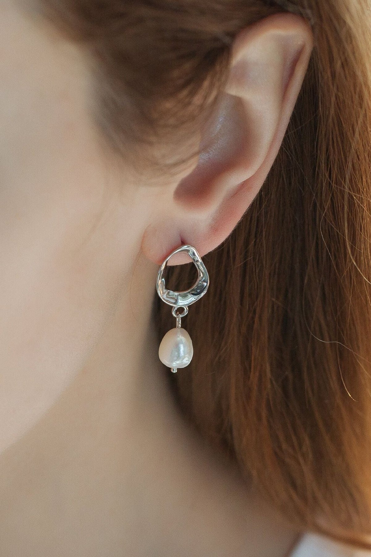 sterling-silver-baroque-pearl-drop-earrings-in-silver-model
