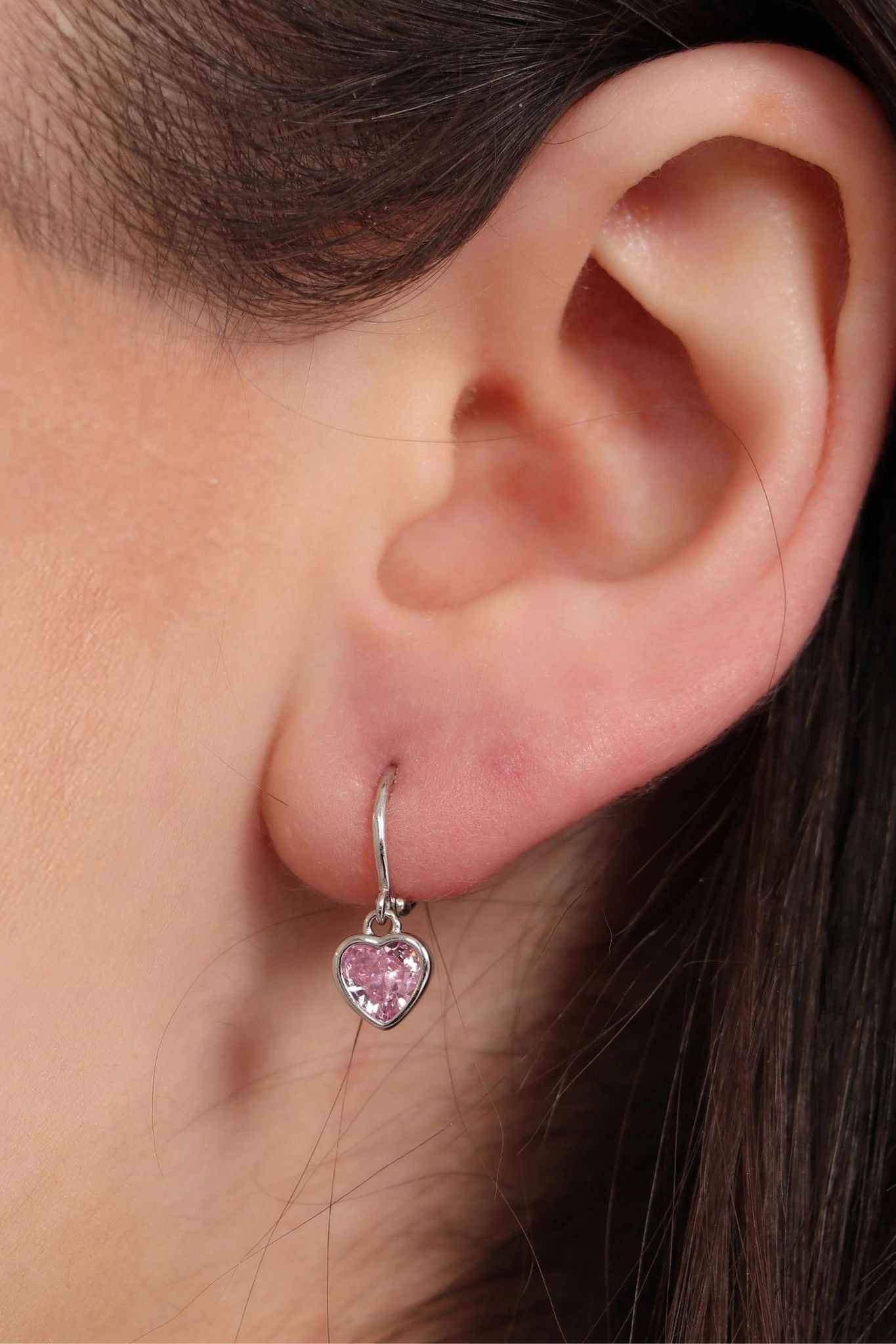 sterling-silver-cz-heart-hoops-in-silver-pink-model