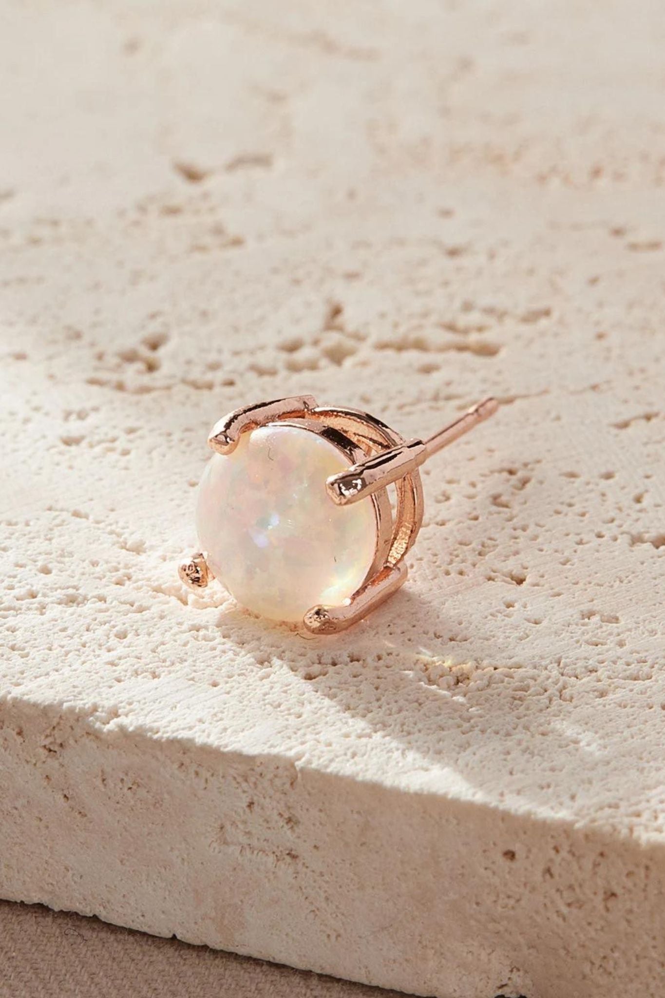 round-opal-stud-earrings-closeup-stone