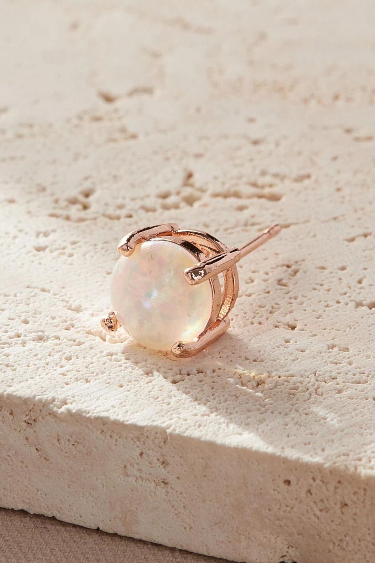 round-opal-stud-earrings-closeup-stone