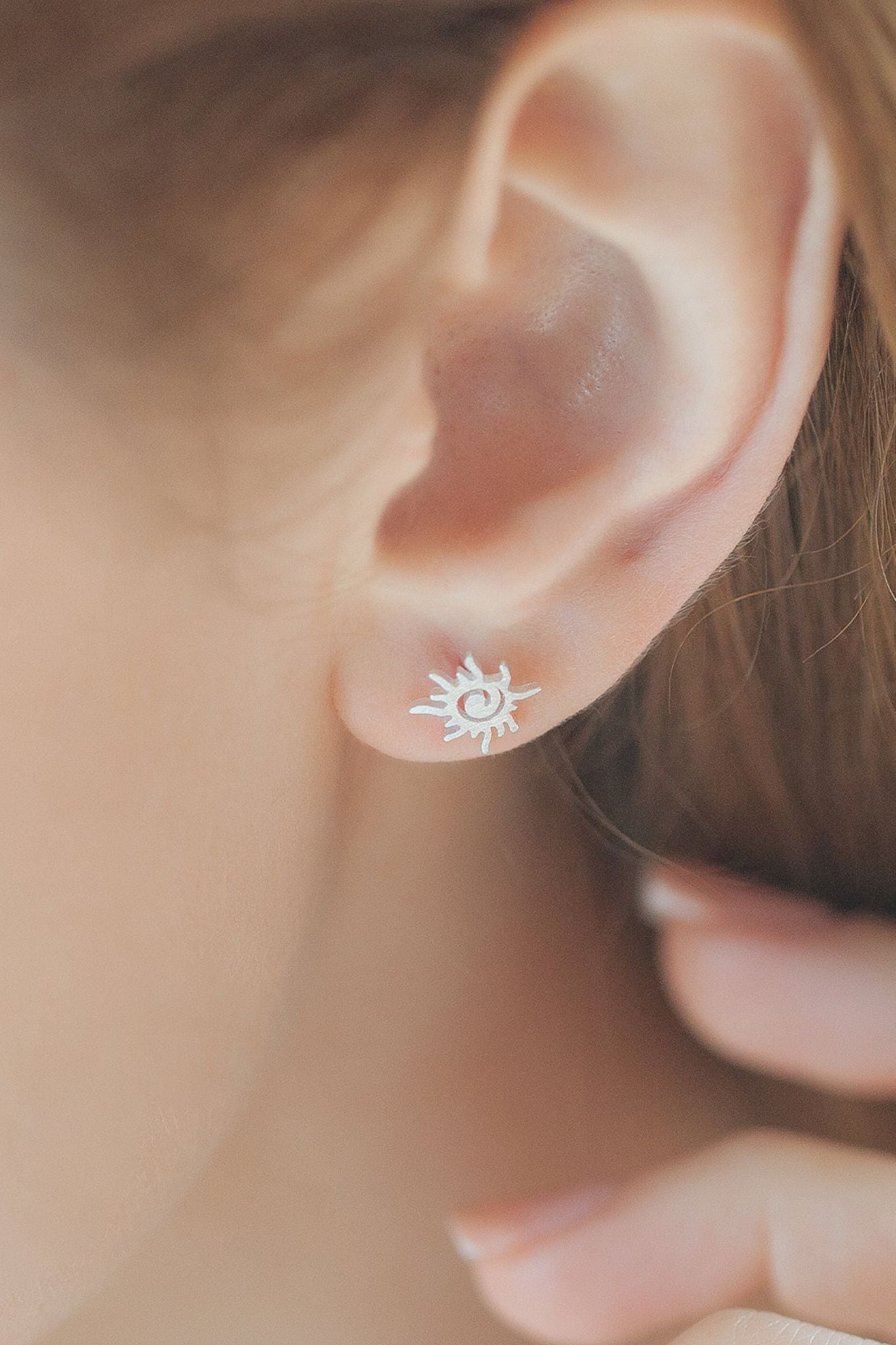 sterling-silver-flaming-sun-studs-model