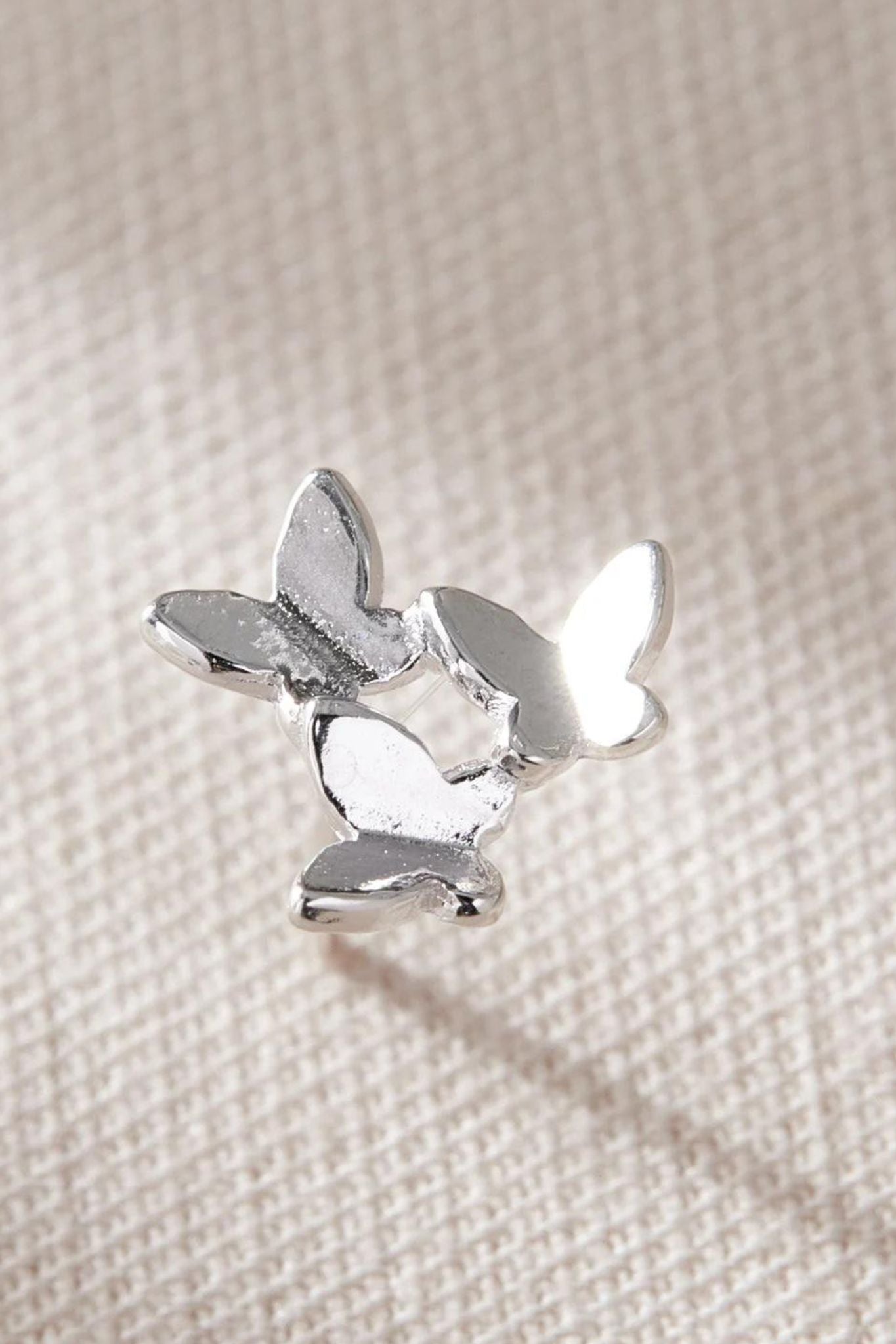 sterling-silver-butterfly-trio-studs-closeup
