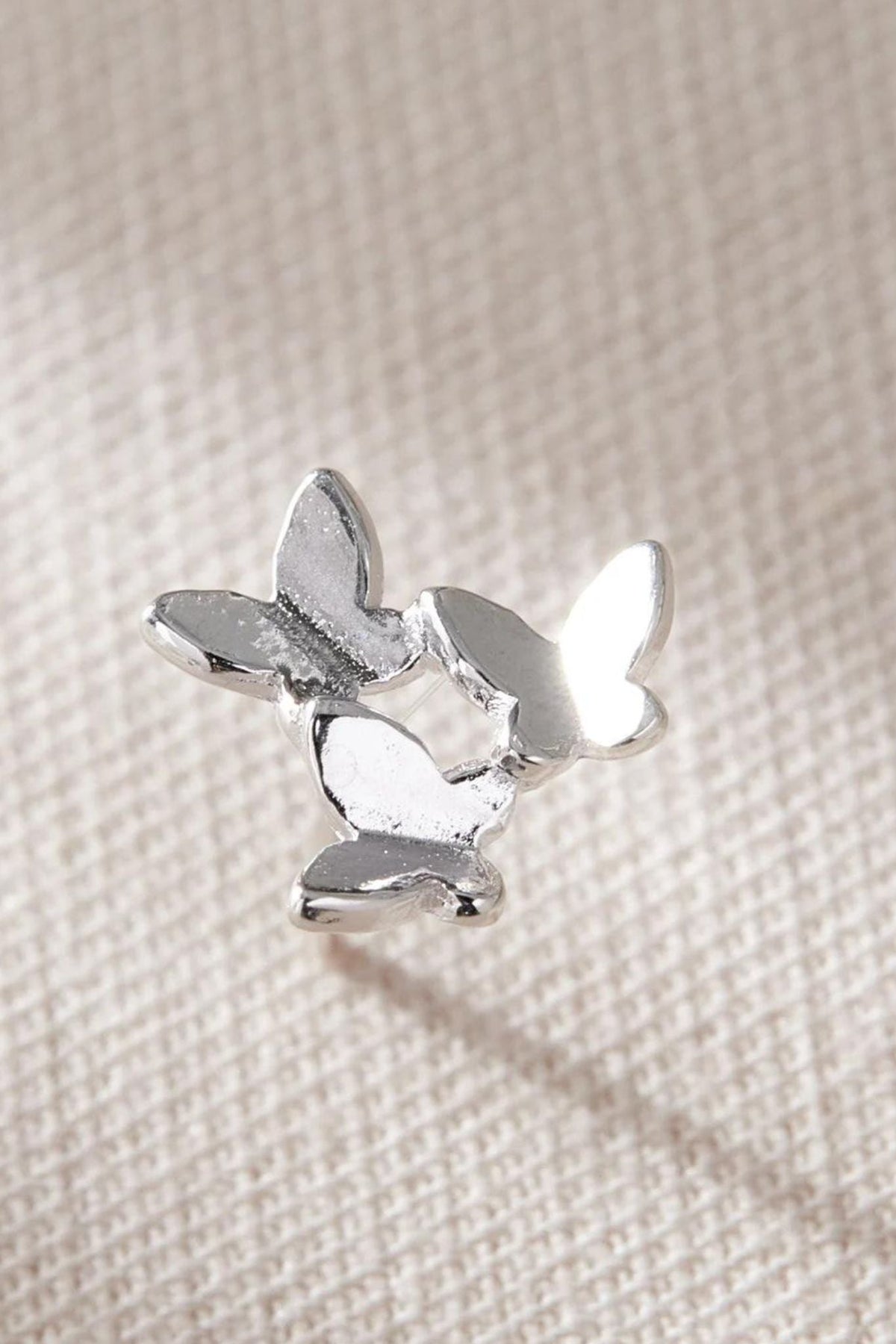 sterling-silver-butterfly-trio-studs-closeup