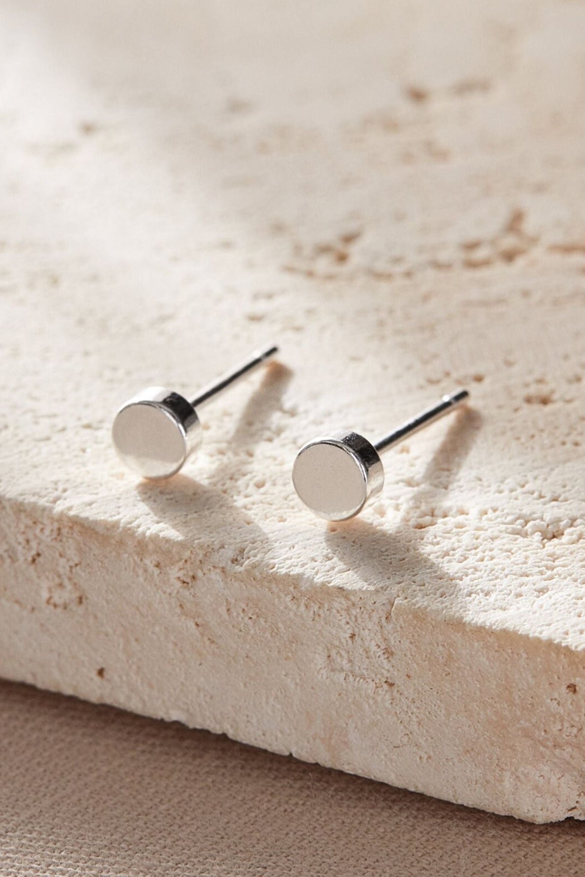 sterling-silver-tiny-disc-studs-in-silver