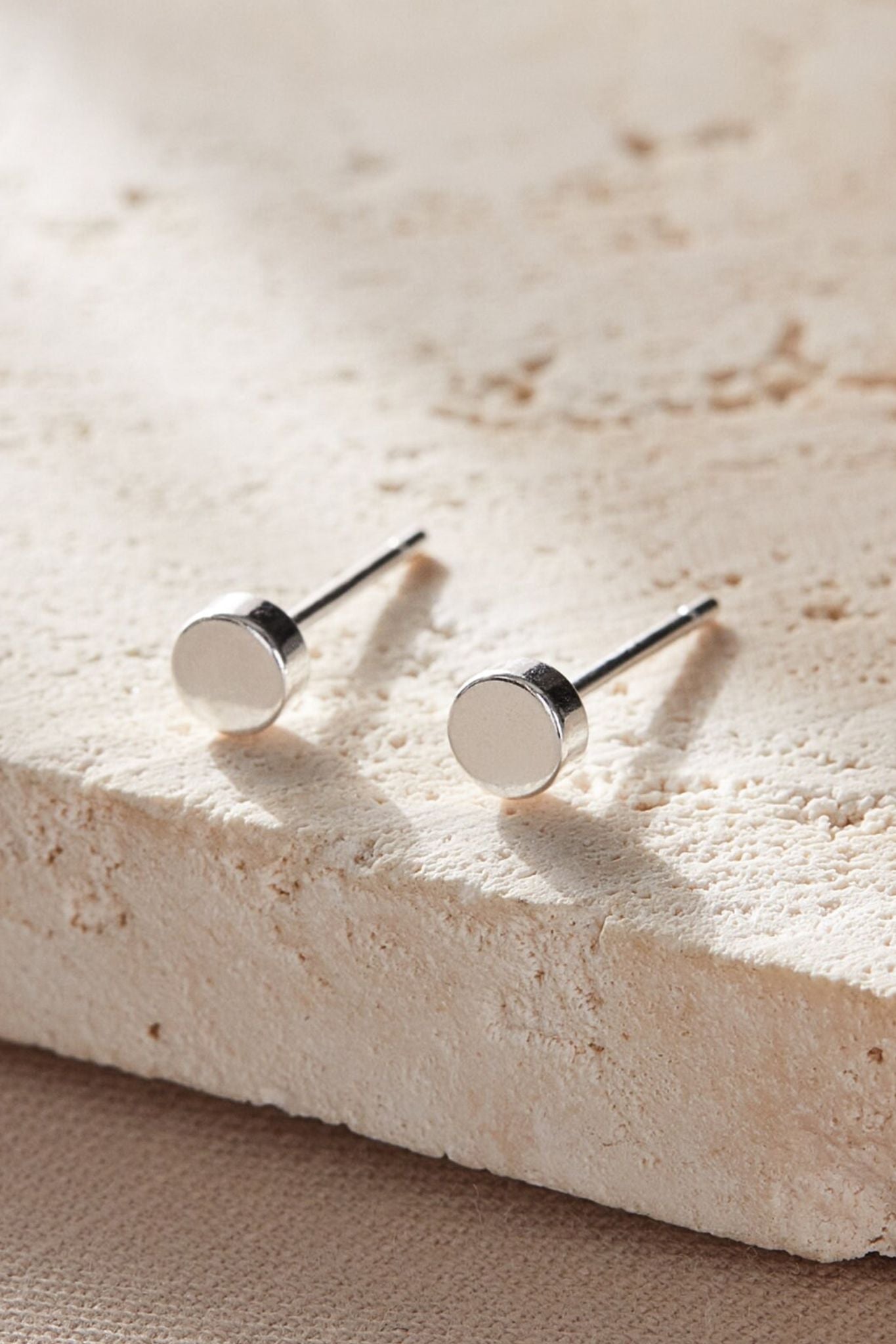sterling-silver-tiny-disc-studs-in-silver