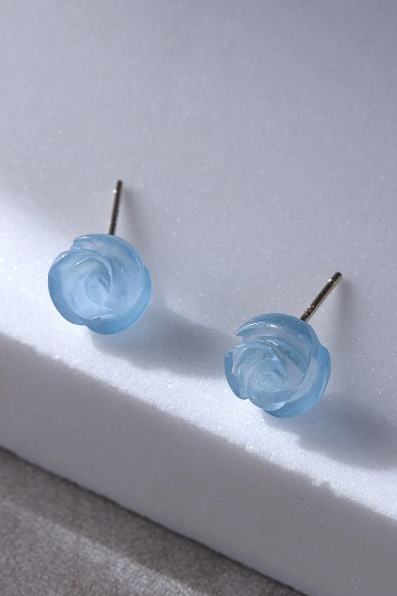 blue-crystal-rose-flower-studs-closeup