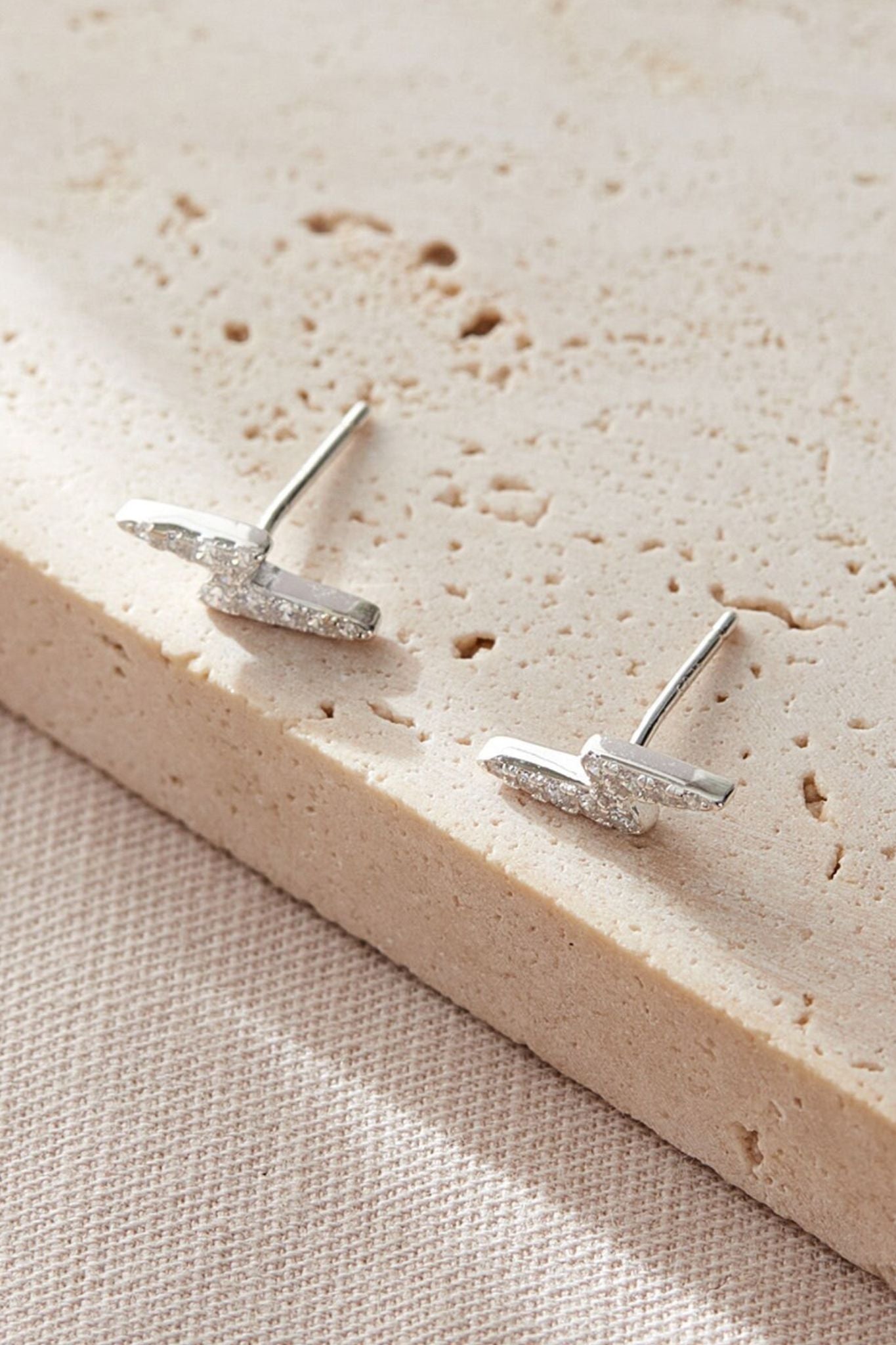 sterling-silver-cz-lightning-bolt-studs-in-silver-white