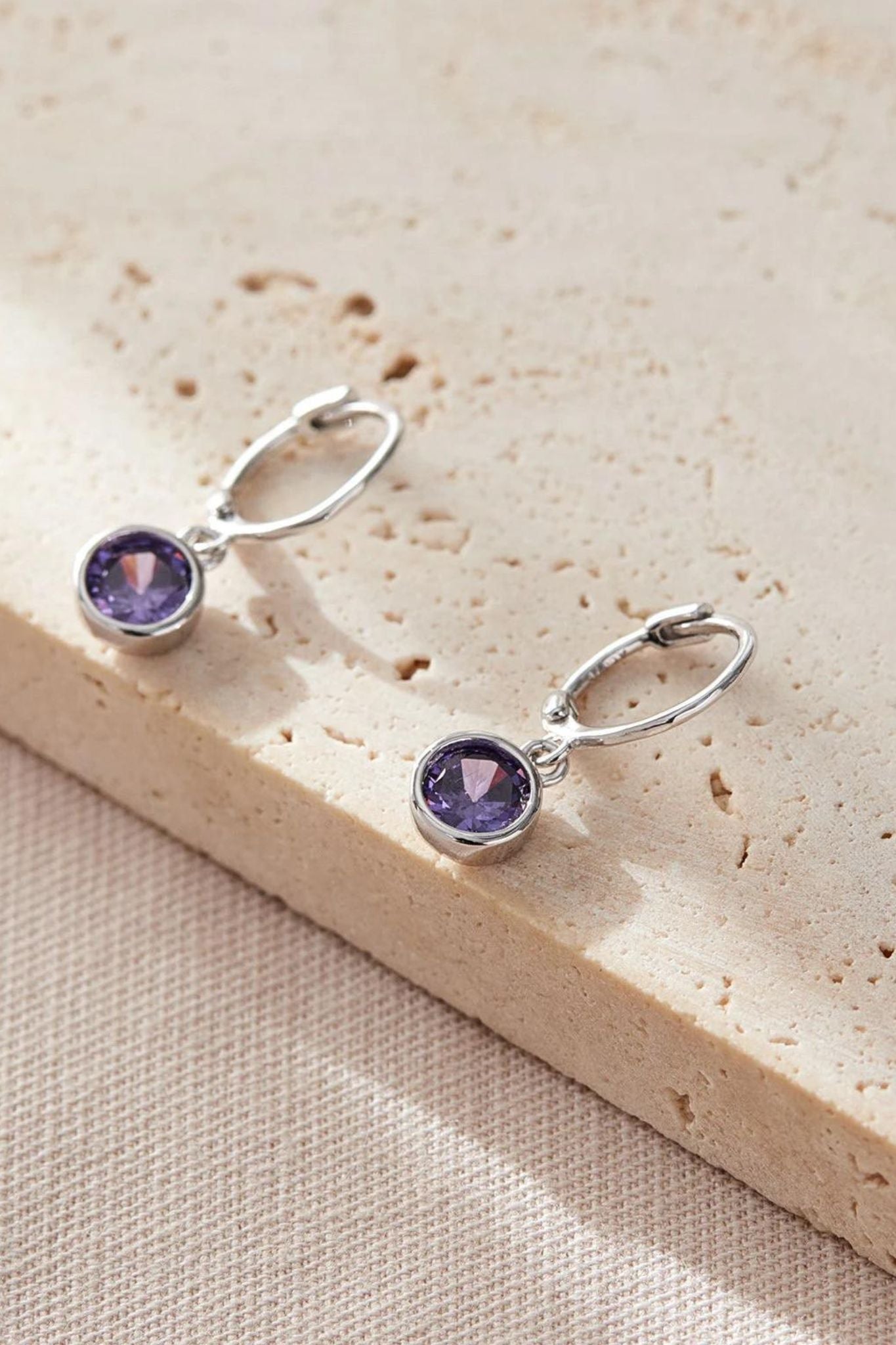 sterling-silver-cz-huggie-hoops-in-silver-purple