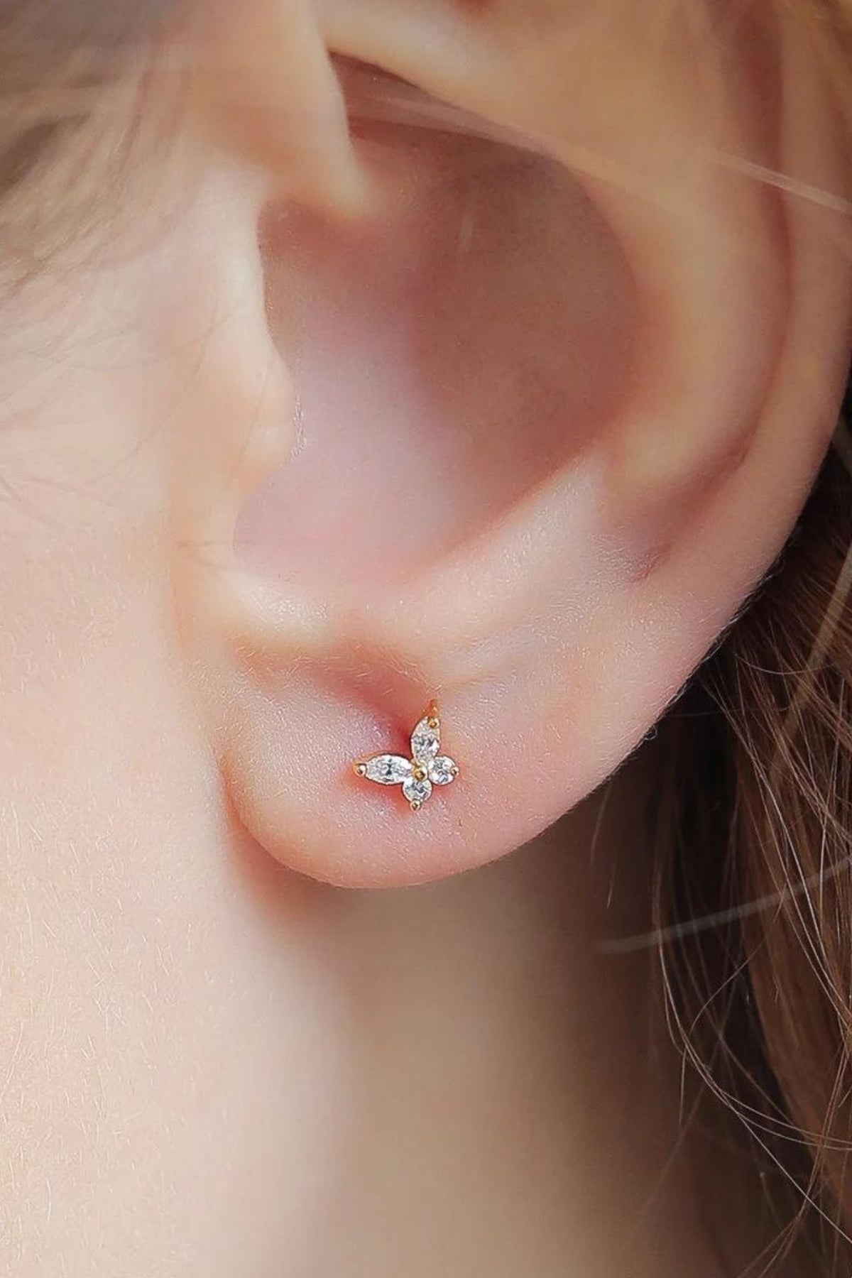 sterling-silver-cz-butterfly-studs-in-gold-model