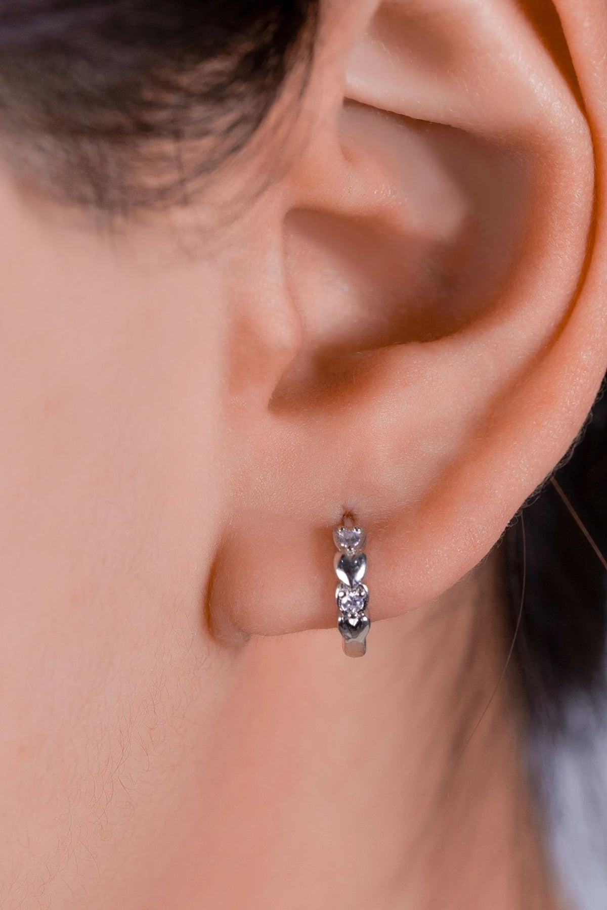 sterling-silver-cz-sparkly-heart-huggie-hoops-model