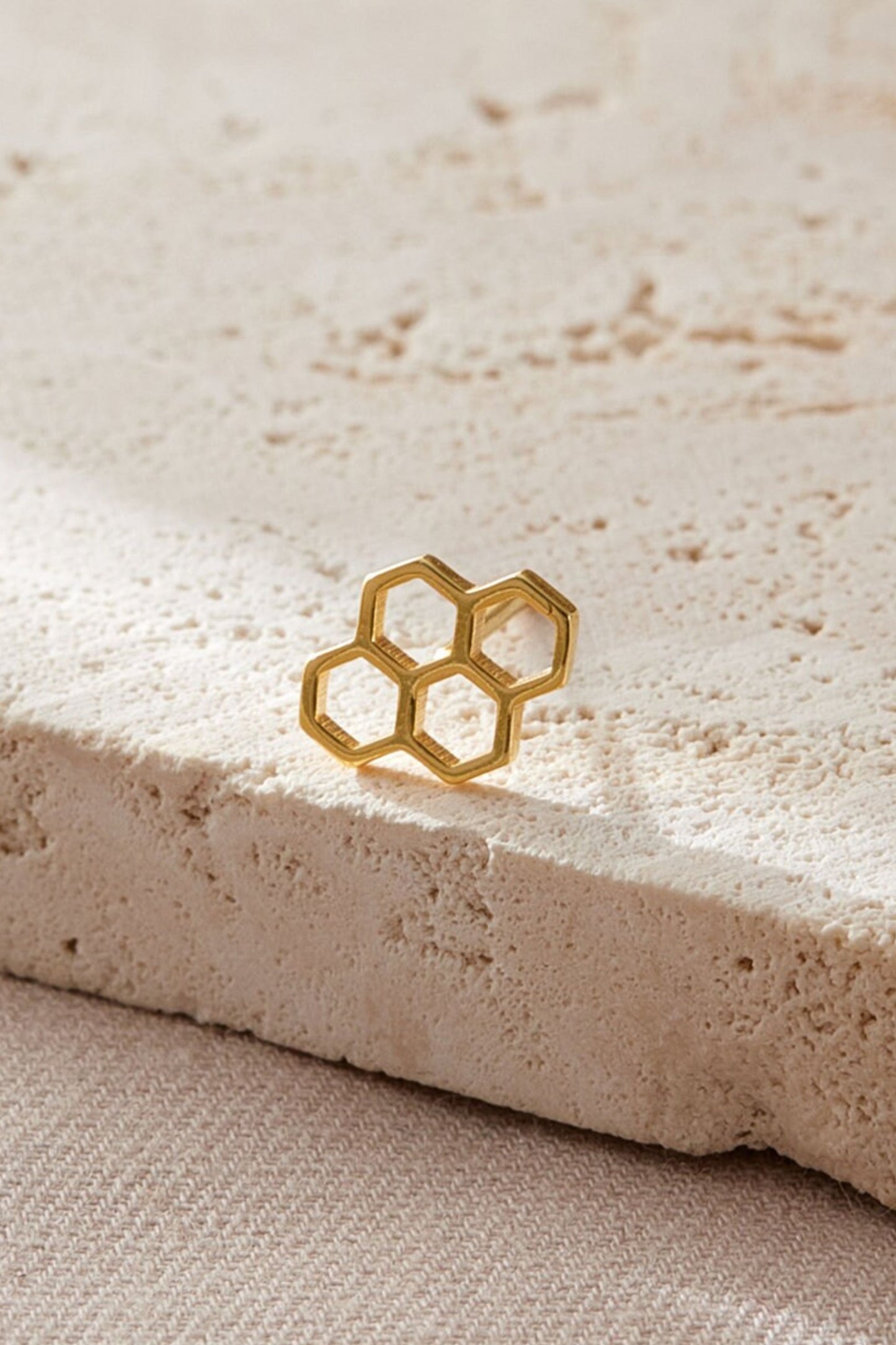 sterling-silver-honeycomb-studs-in-gold-closeup