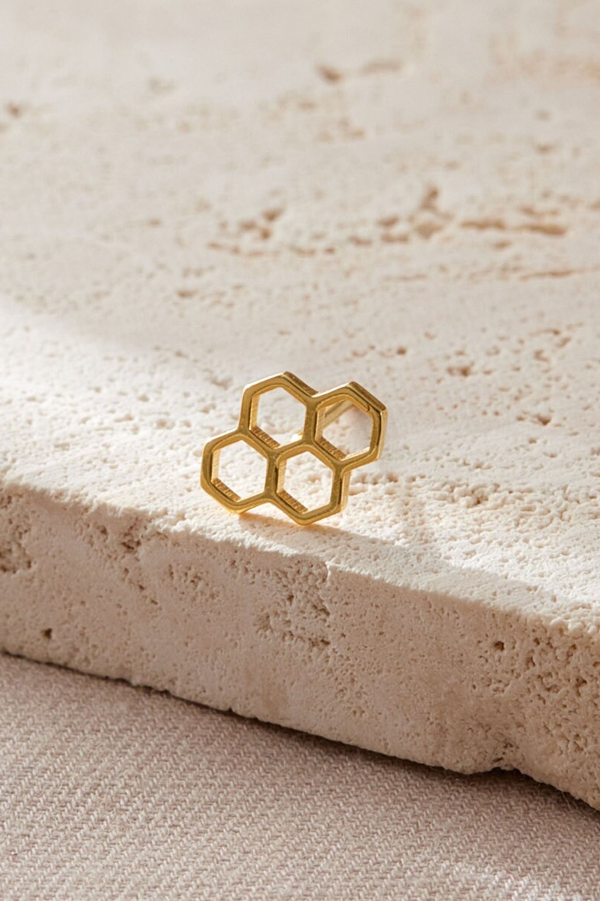 sterling-silver-honeycomb-studs-in-gold-closeup