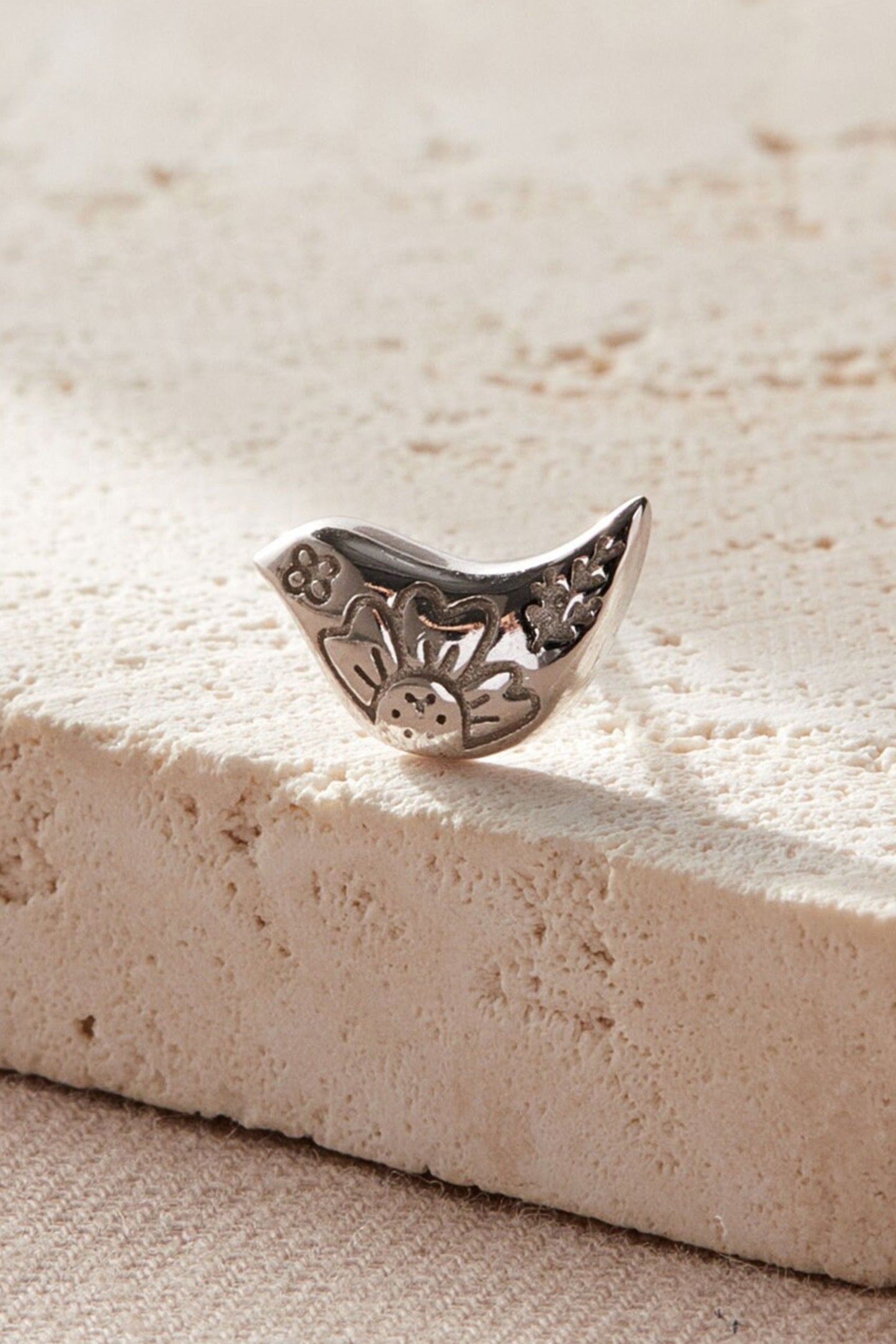 sterling-silver-songbird-studs-in-silver-closeup