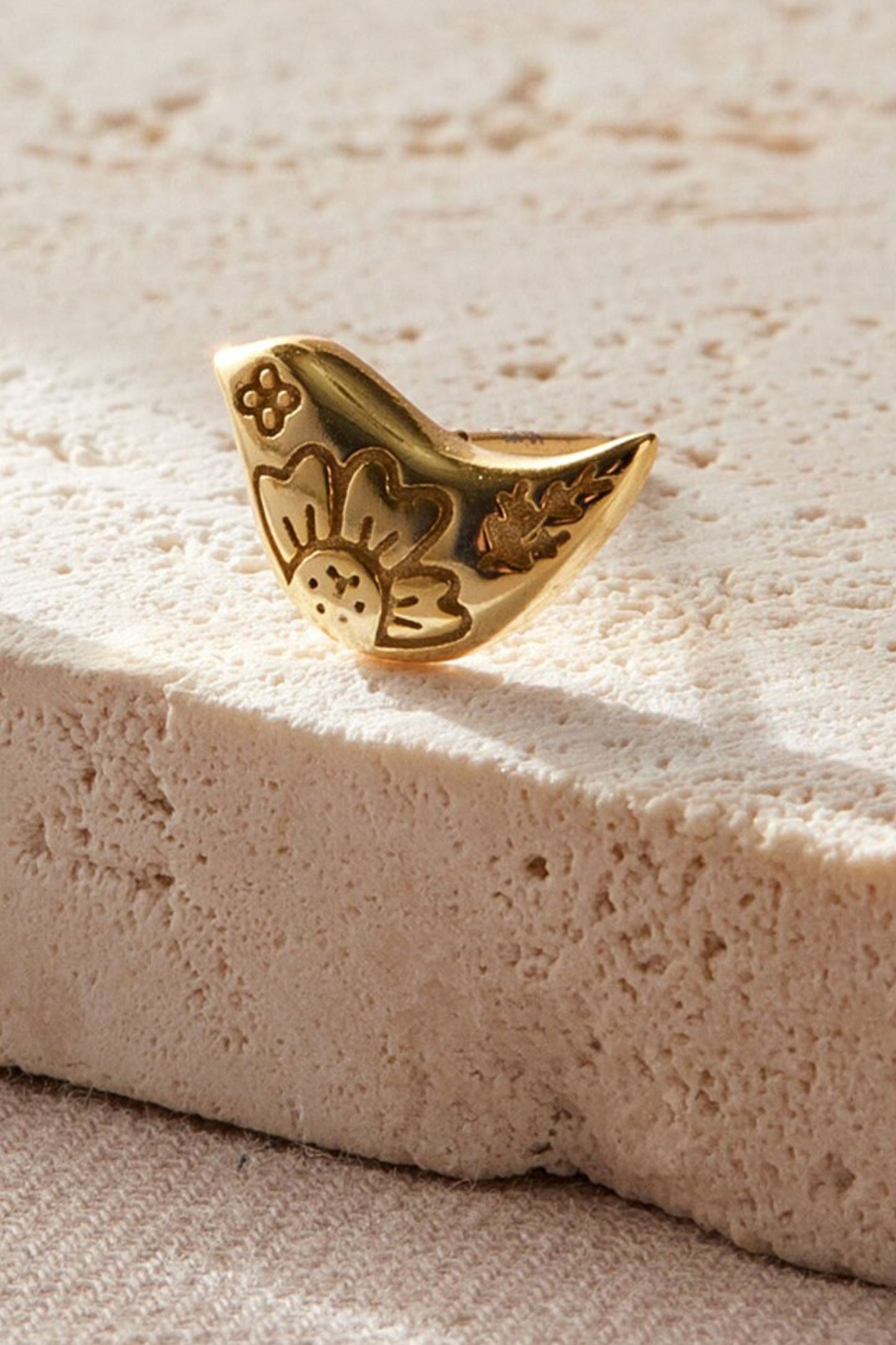 sterling-silver-songbird-studs-in-gold-closeup
