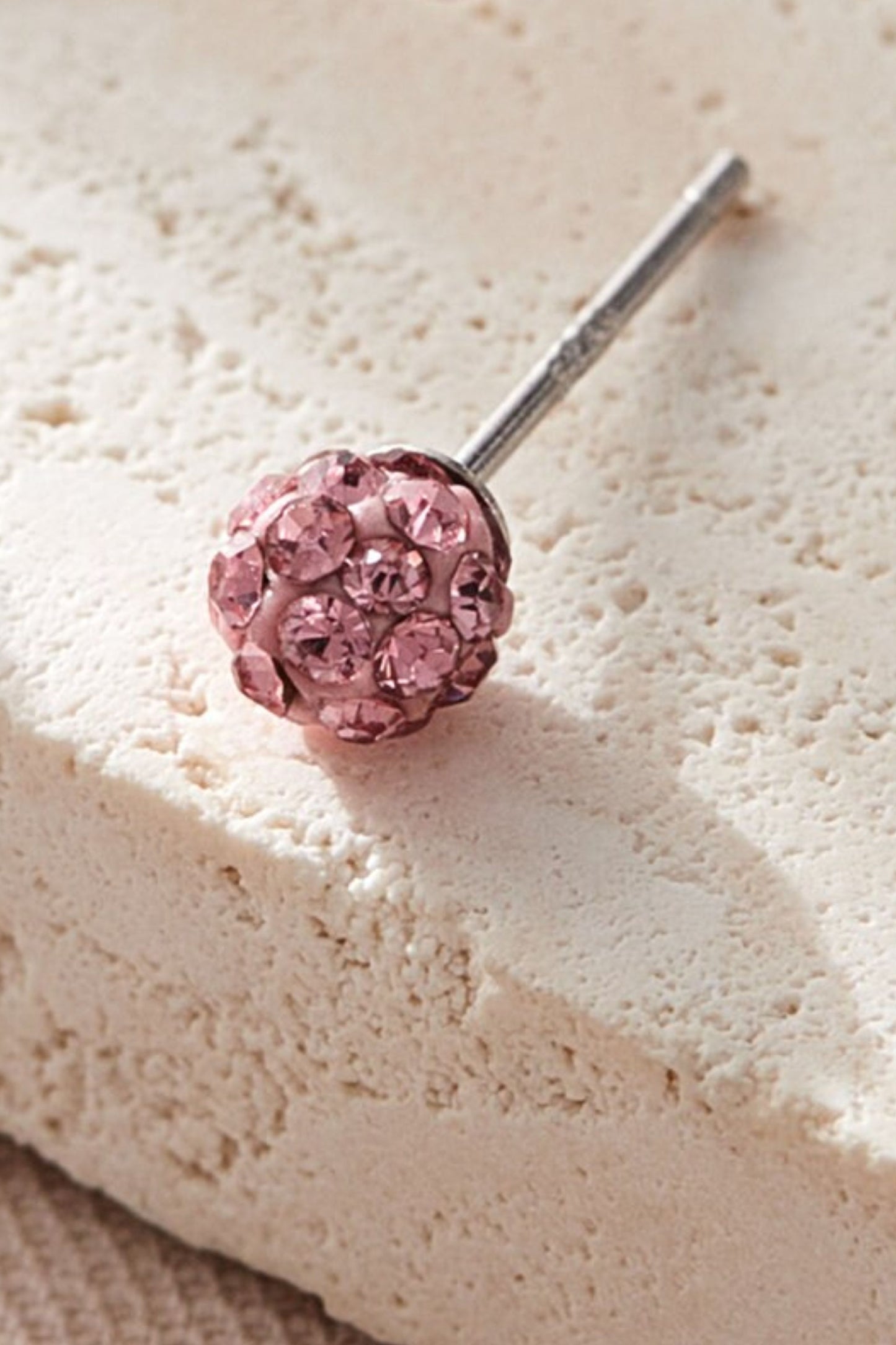 sterling-silver-cz-disco-ball-studs-in-pink-closeup