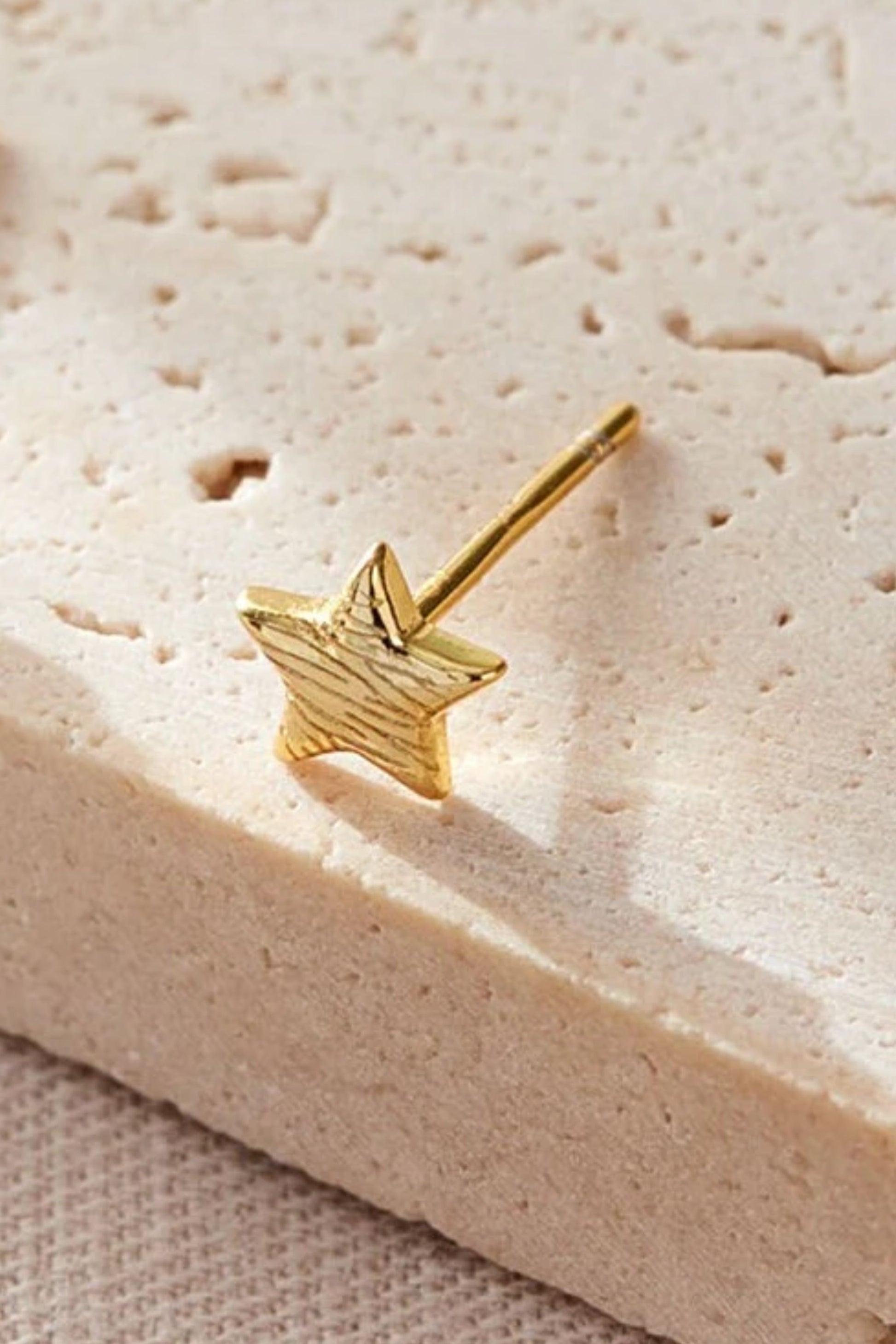 sterling-silver-zebra-stripe-star-studs-in-gold-1-closeup