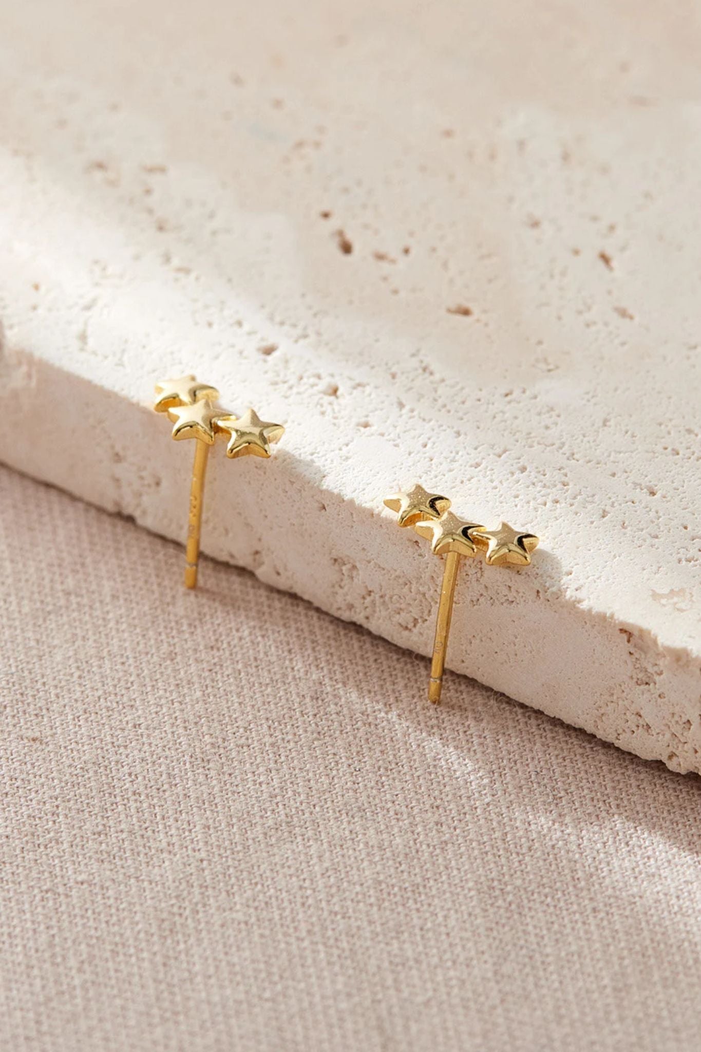 sterling-silver-triple-star-studs-in-gold-butterfly-backs
