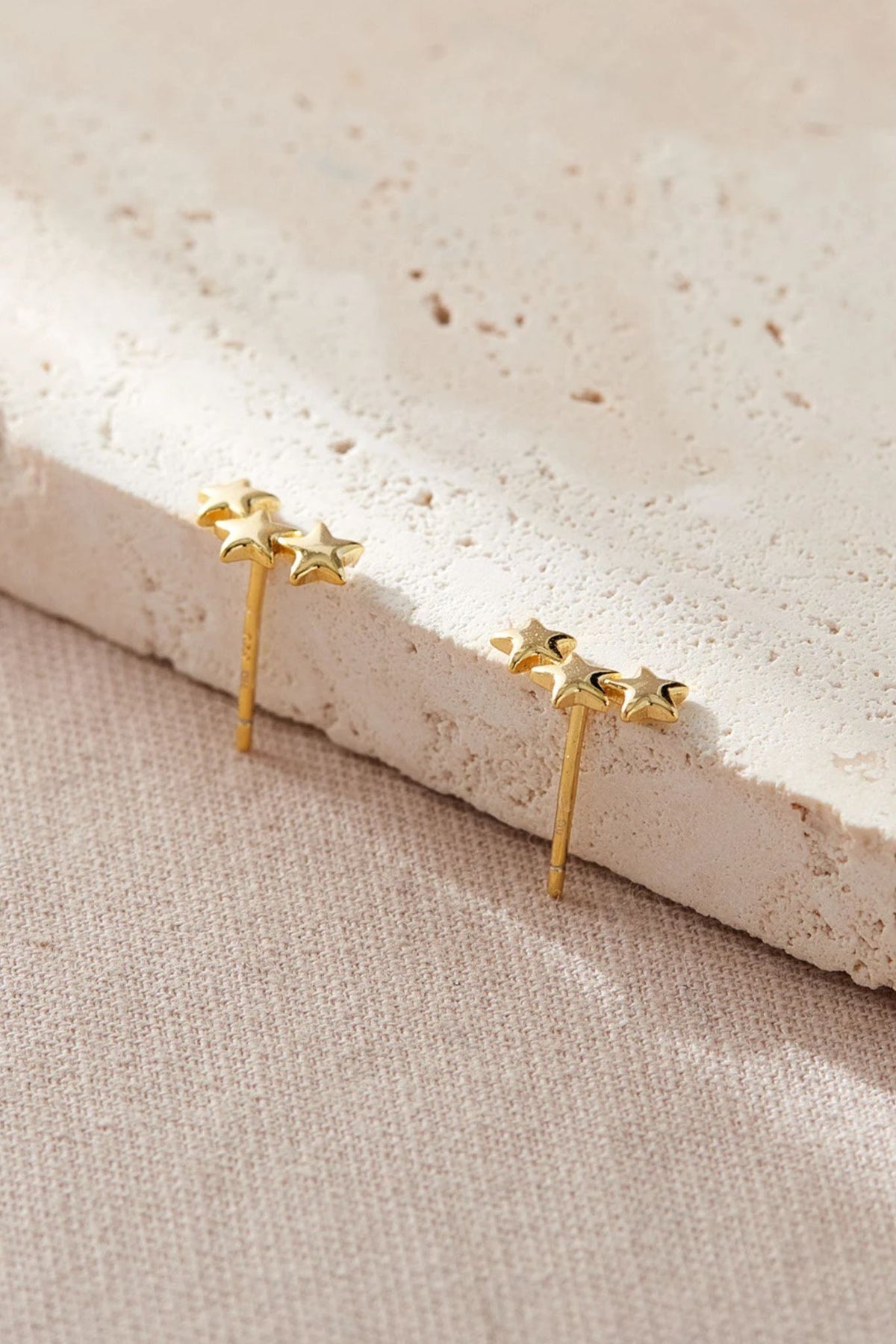 sterling-silver-triple-star-studs-in-gold-butterfly-backs