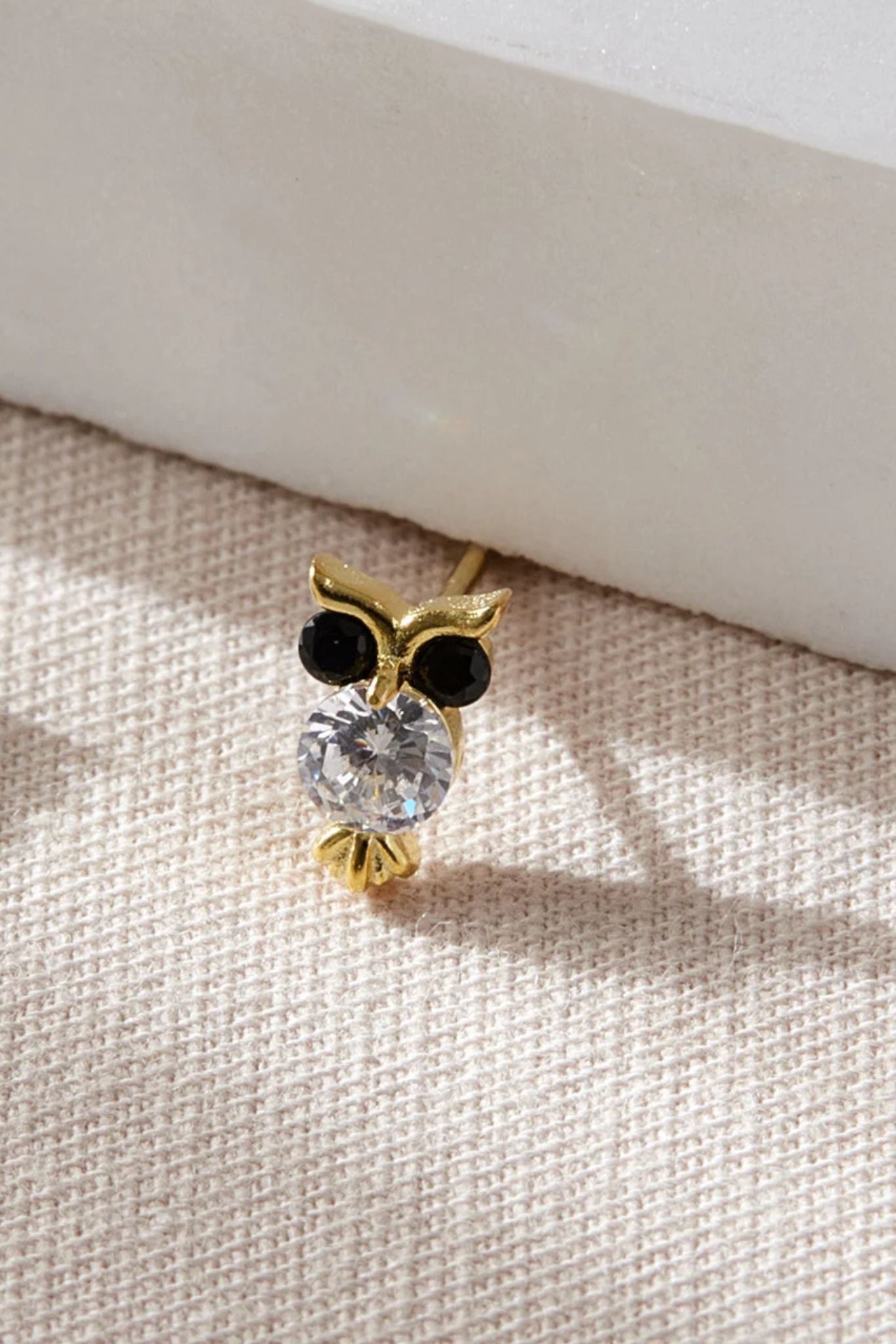 sterling-silver-cz-owl-studs-in-gold-closeup