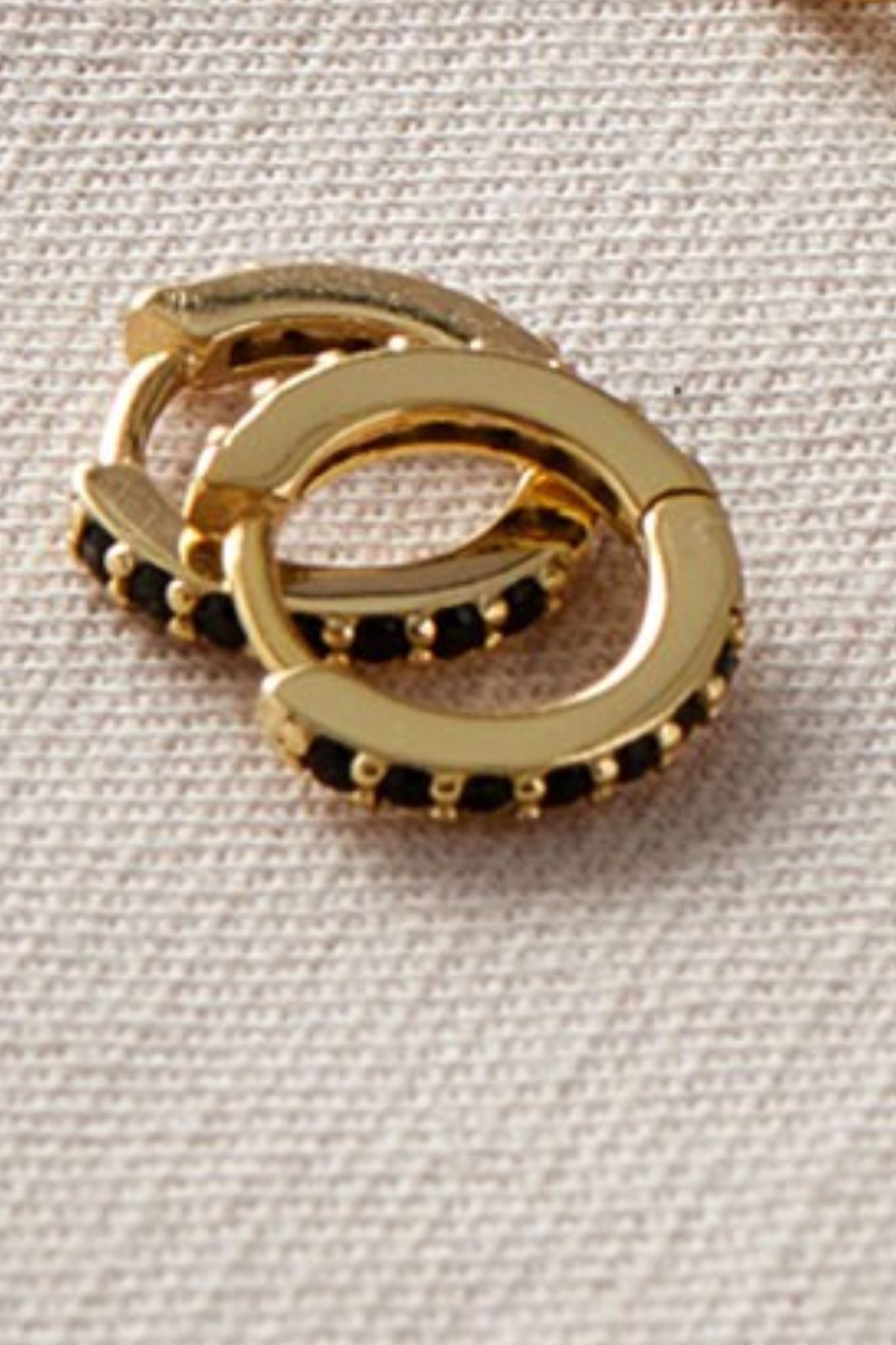 sterling-silver-cz-huggie-hoops-in-gold-black
