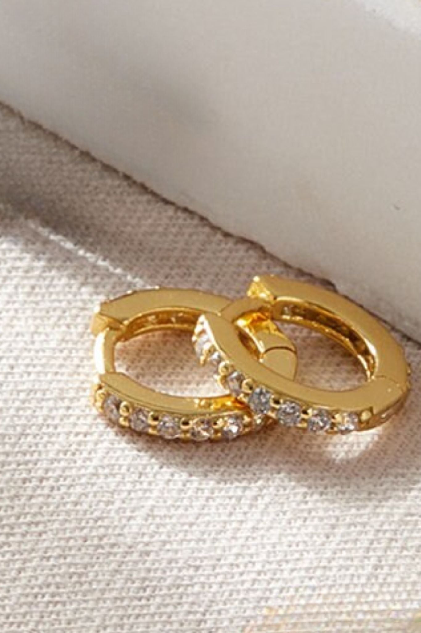 sterling-silver-cz-huggie-hoops-in-gold-white