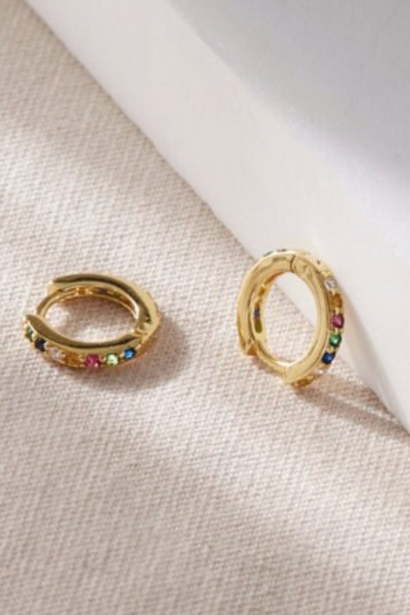 sterling-silver-cz-huggie-hoops-in-gold-multi