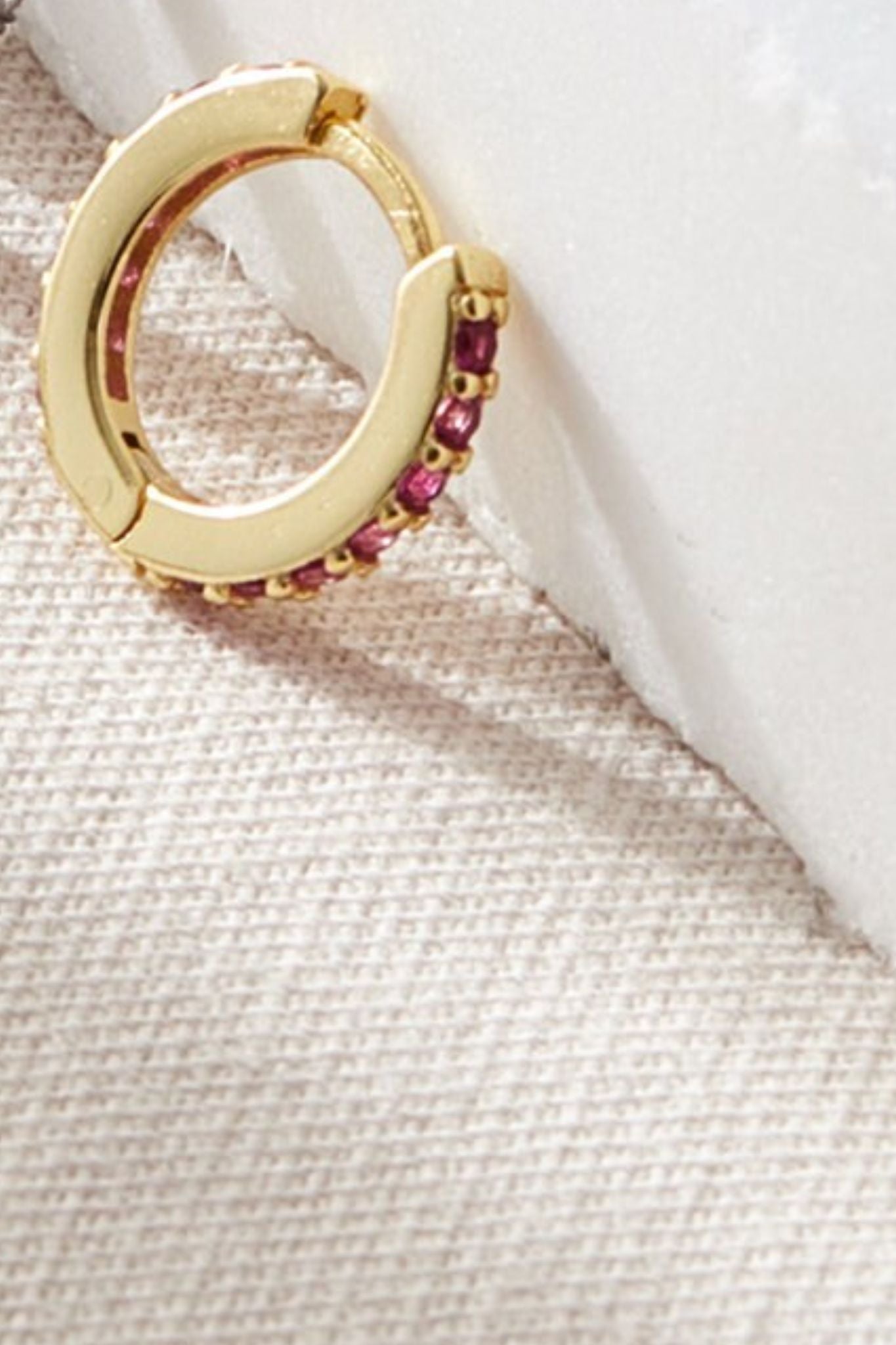 sterling-silver-cz-huggie-hoops-in-gold-pink