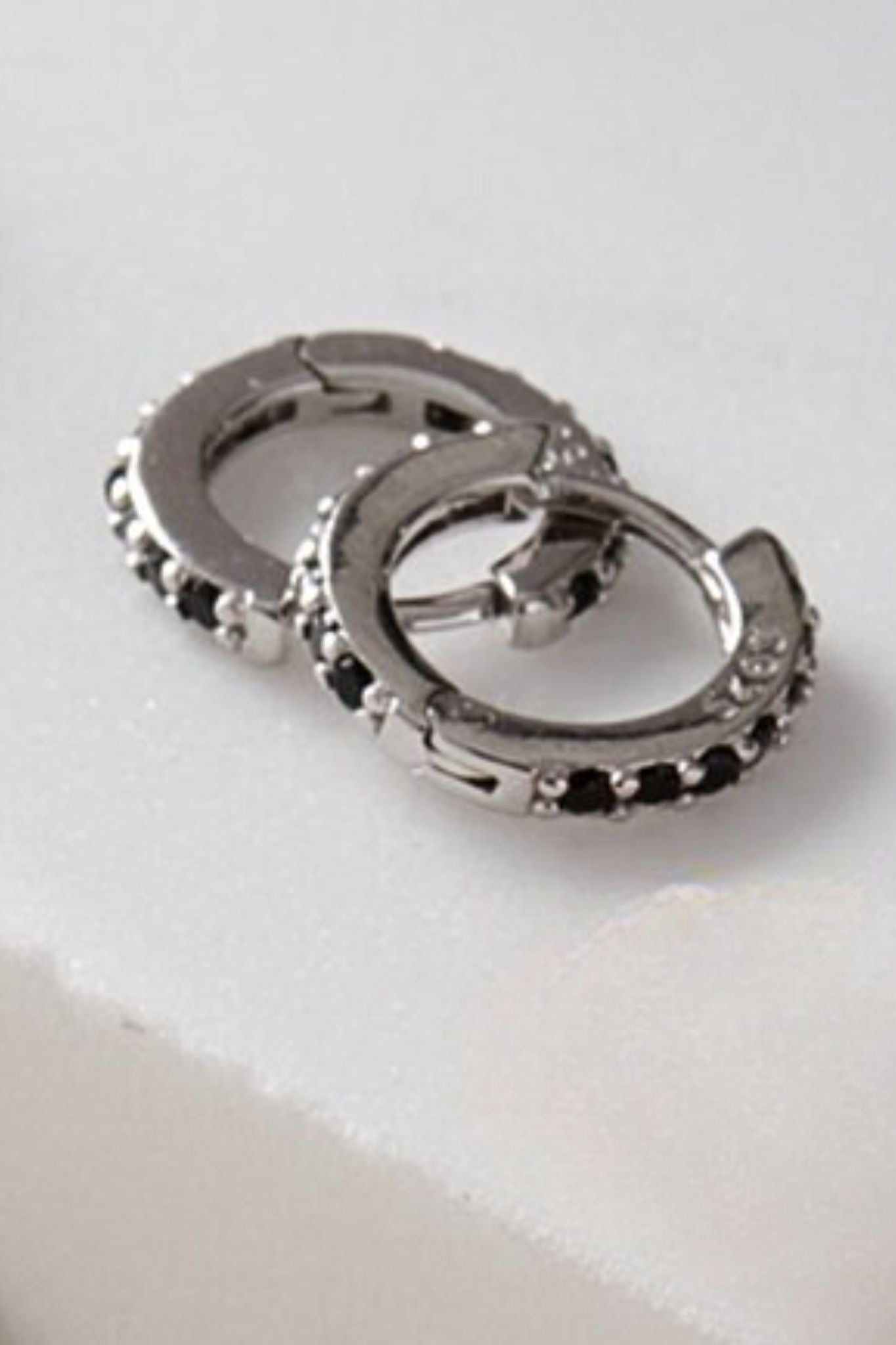 sterling-silver-cz-huggie-hoops-in-silver-black