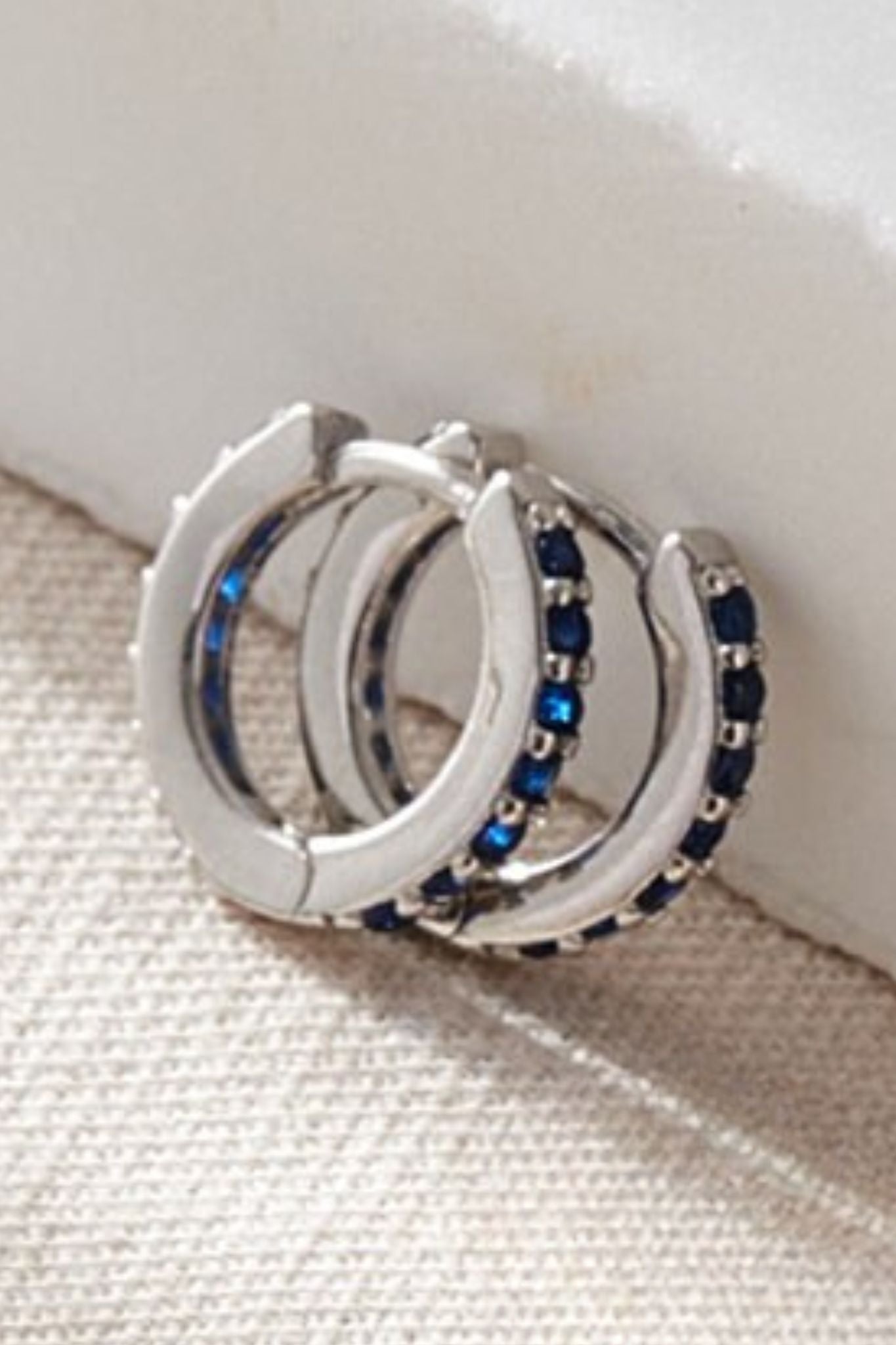 sterling-silver-cz-huggie-hoops-in-silver-blue