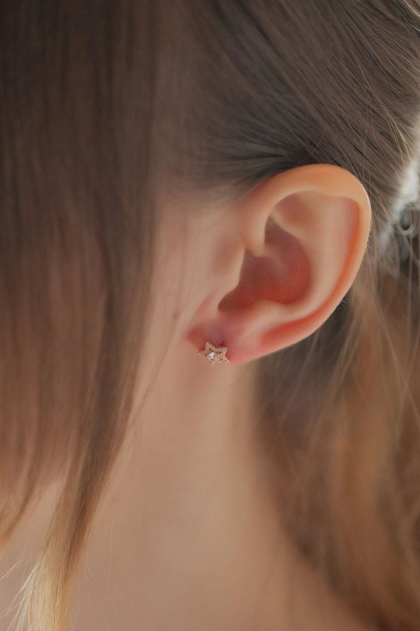 sterling-silver-cz-star-studs-in-rose-gold-model