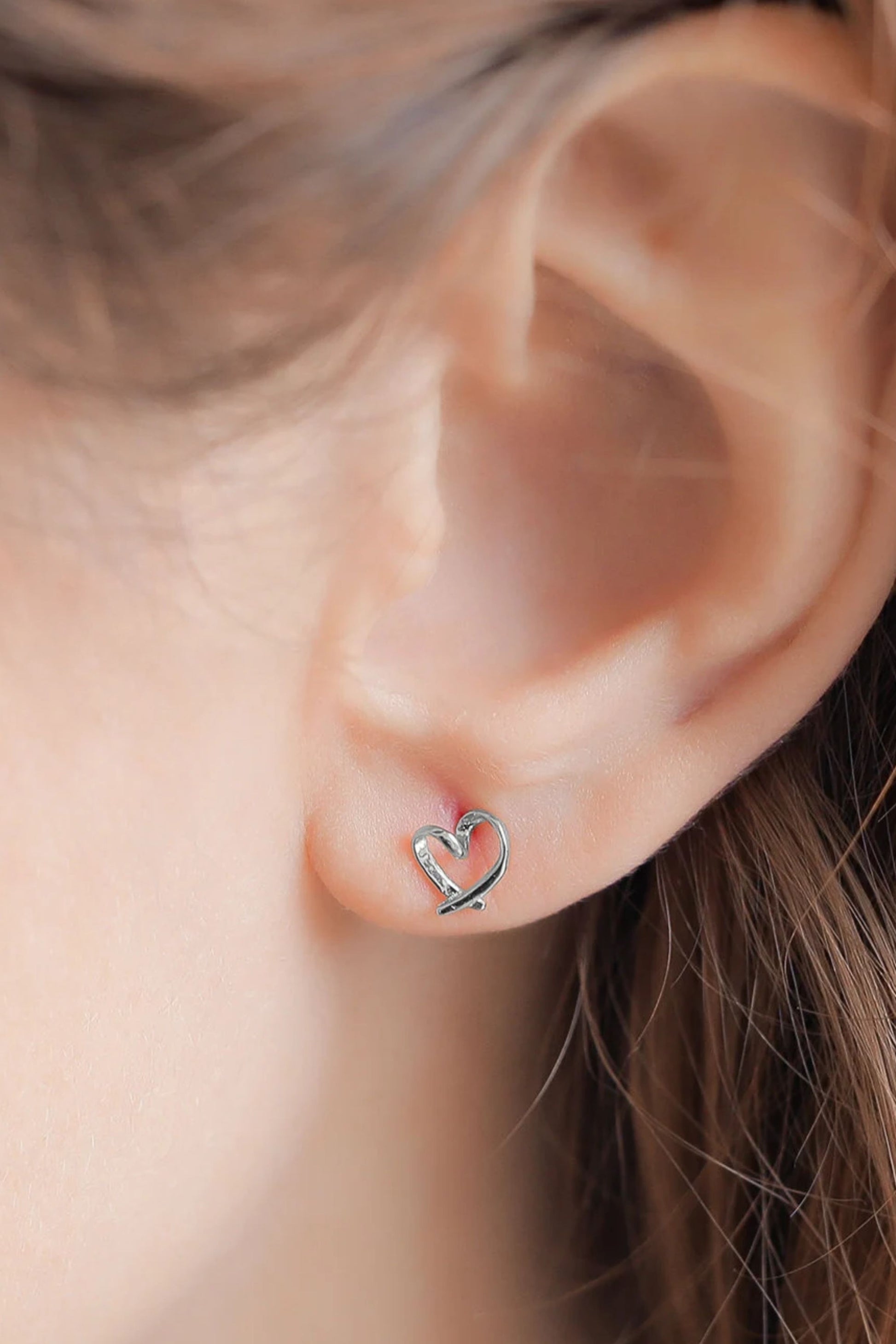 sterling-silver-abstract-heart-studs-in-silver-model