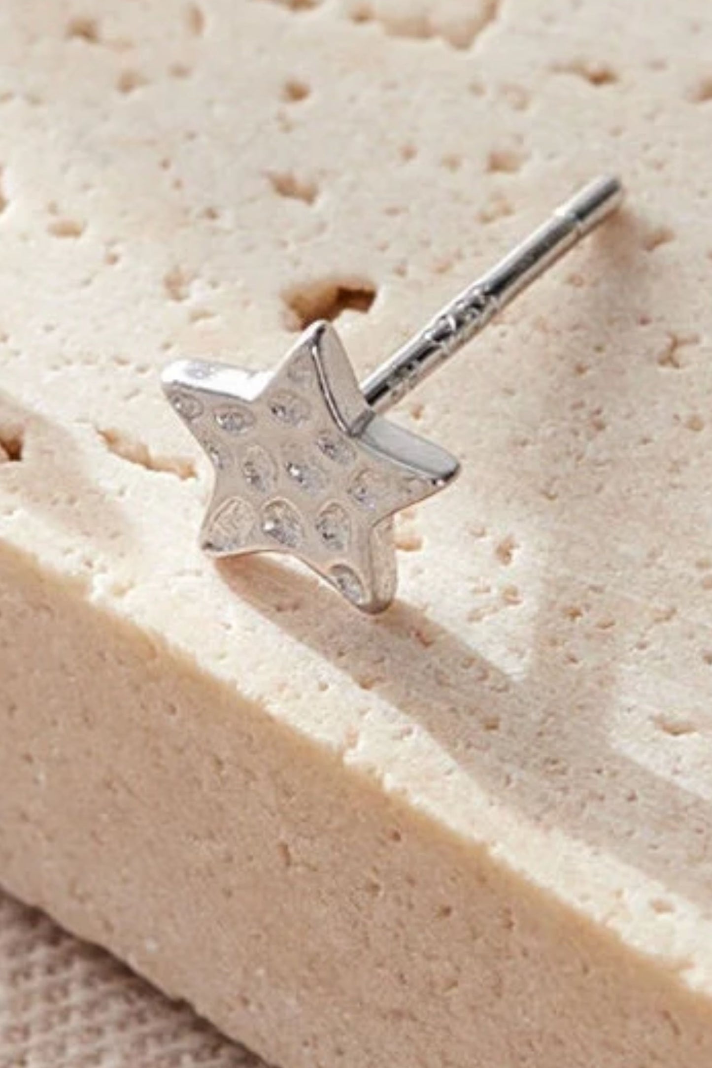 sterling-silver-hammered-star-studs-6mm-in-silver-closeup