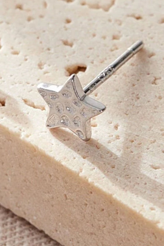sterling-silver-hammered-star-studs-6mm-in-silver-closeup